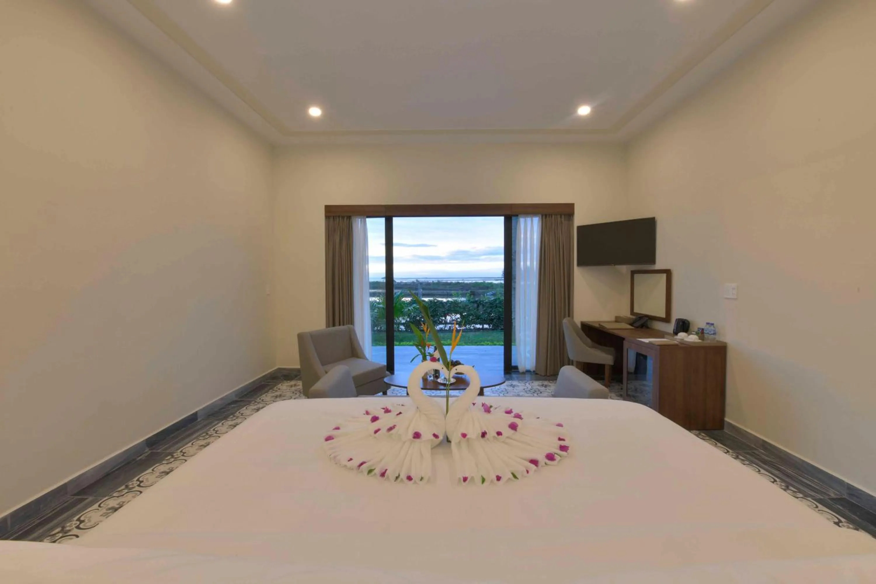 Bed in CocoLand Thu Xa Ancient Town Resort