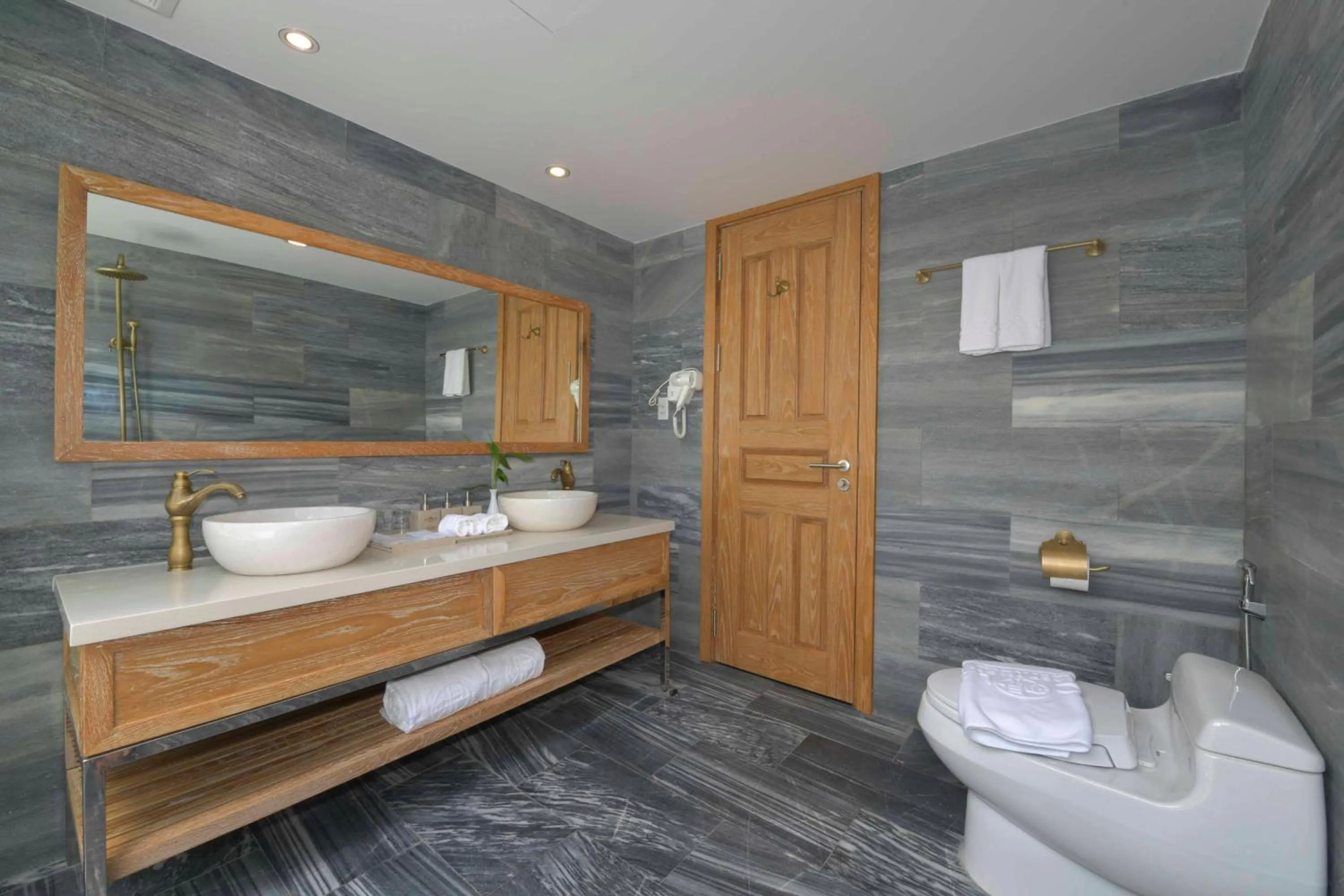 Toilet in CocoLand Thu Xa Ancient Town Resort