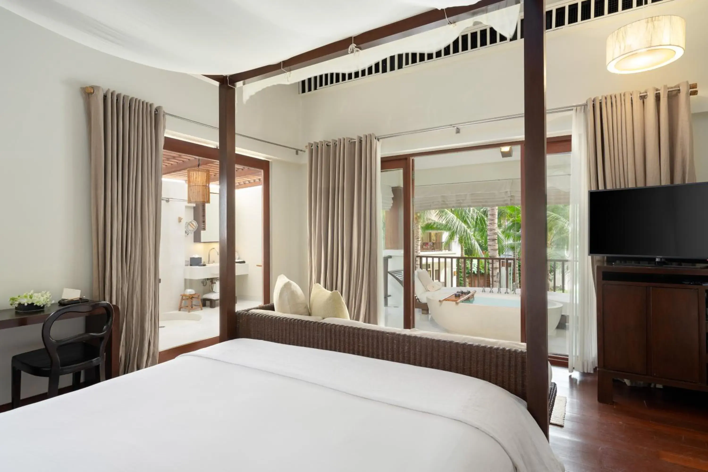Bed in SALA Samui Choengmon Beach Resort Bed in SALA Samui Choengmon Beach Resort