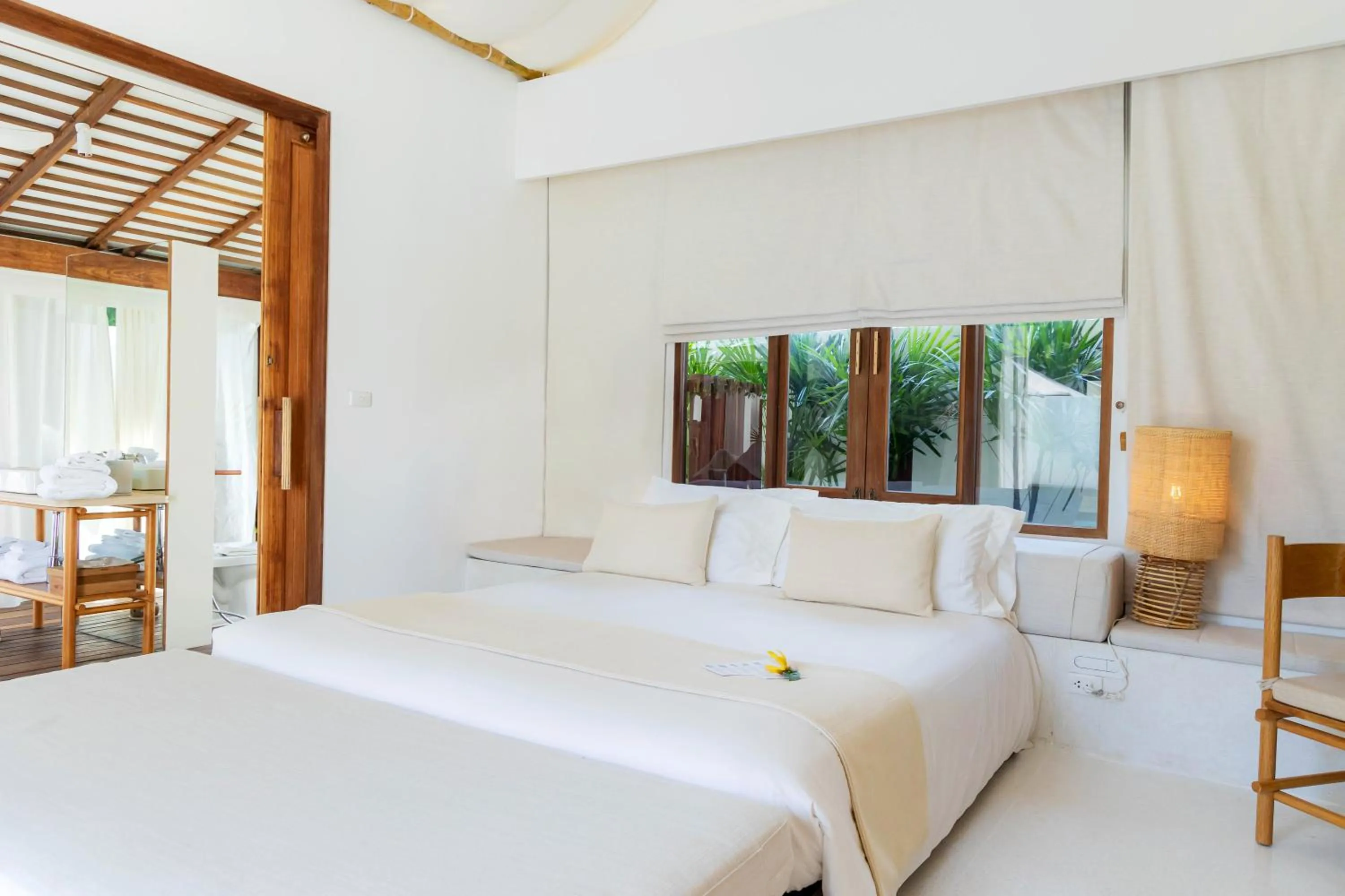 Bed in SALA Samui Choengmon Beach Resort