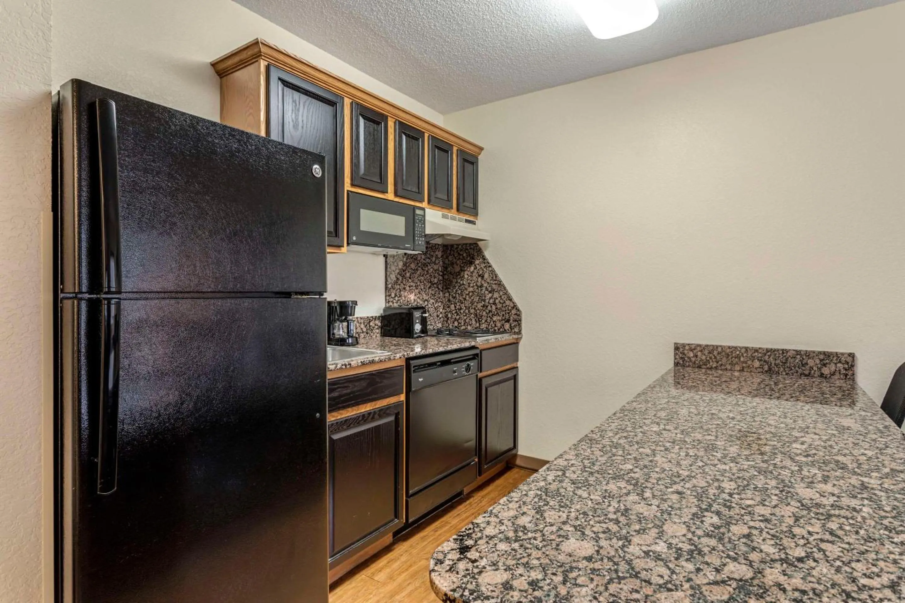 Bedroom, Bed in LeConte Hotel & Convention Center, an Ascend Collection Hotel