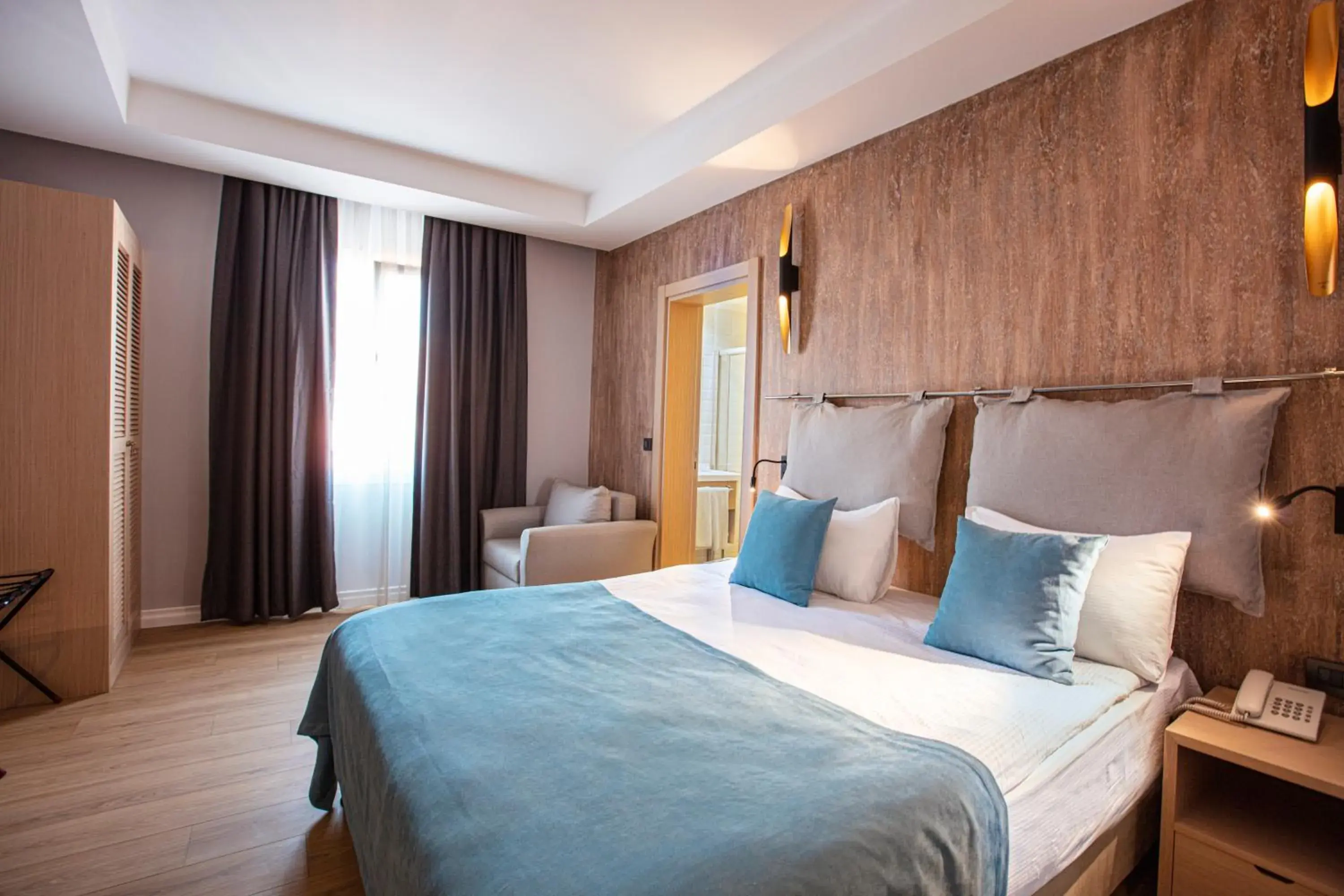 Bed in Eliada Hotel Bed in Eliada Hotel