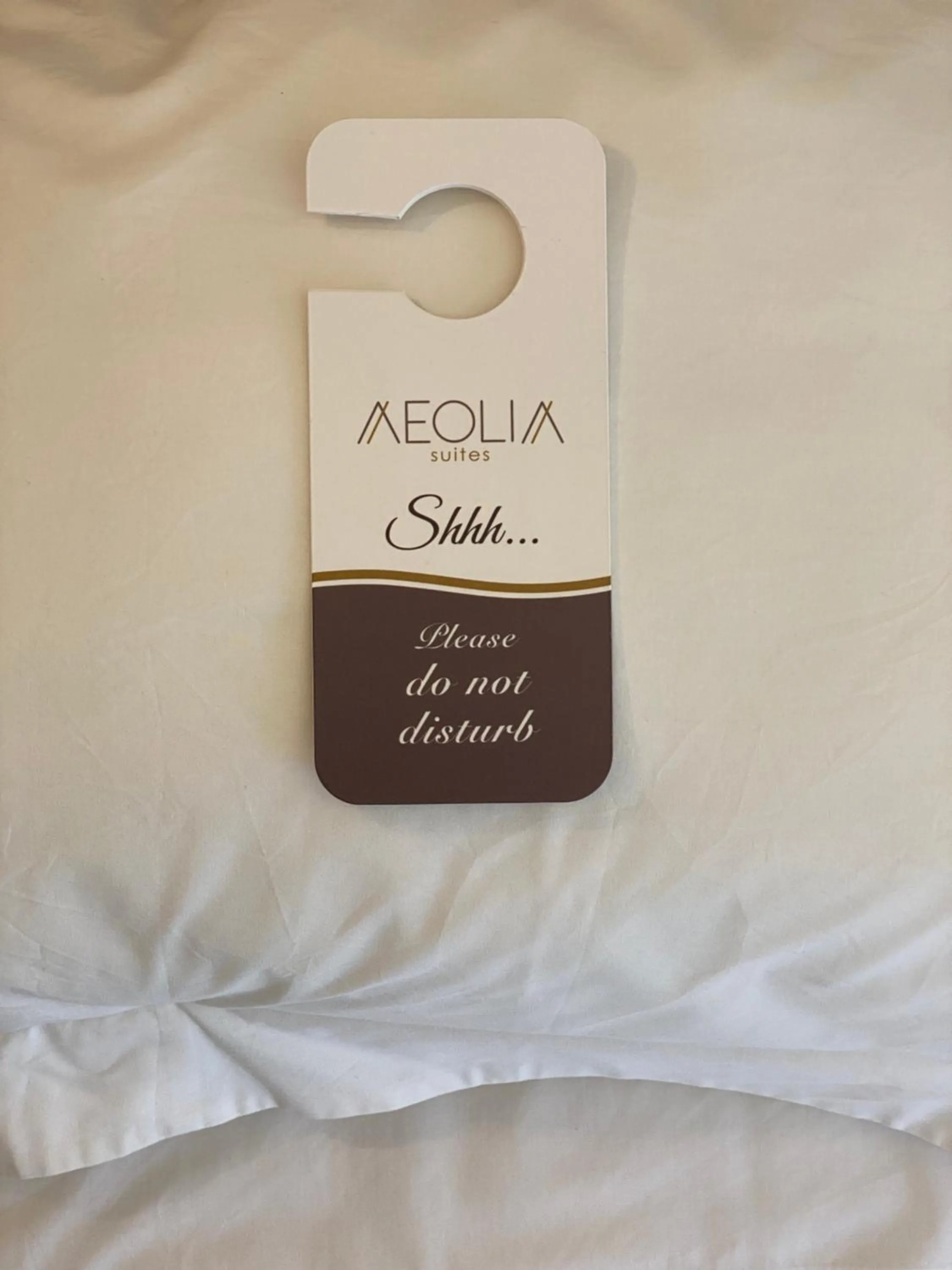 Property logo or sign in Aeolia suites