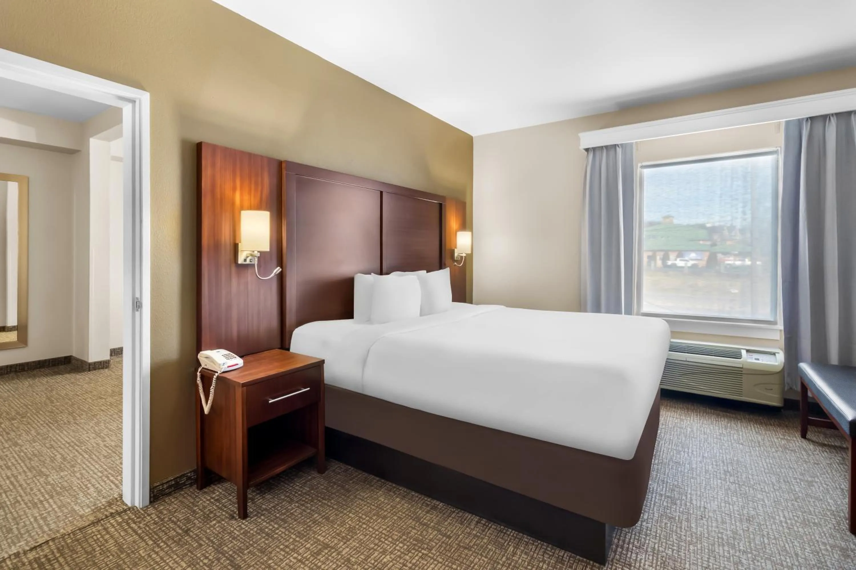 Bed in Comfort Suites At Rivergate Mall