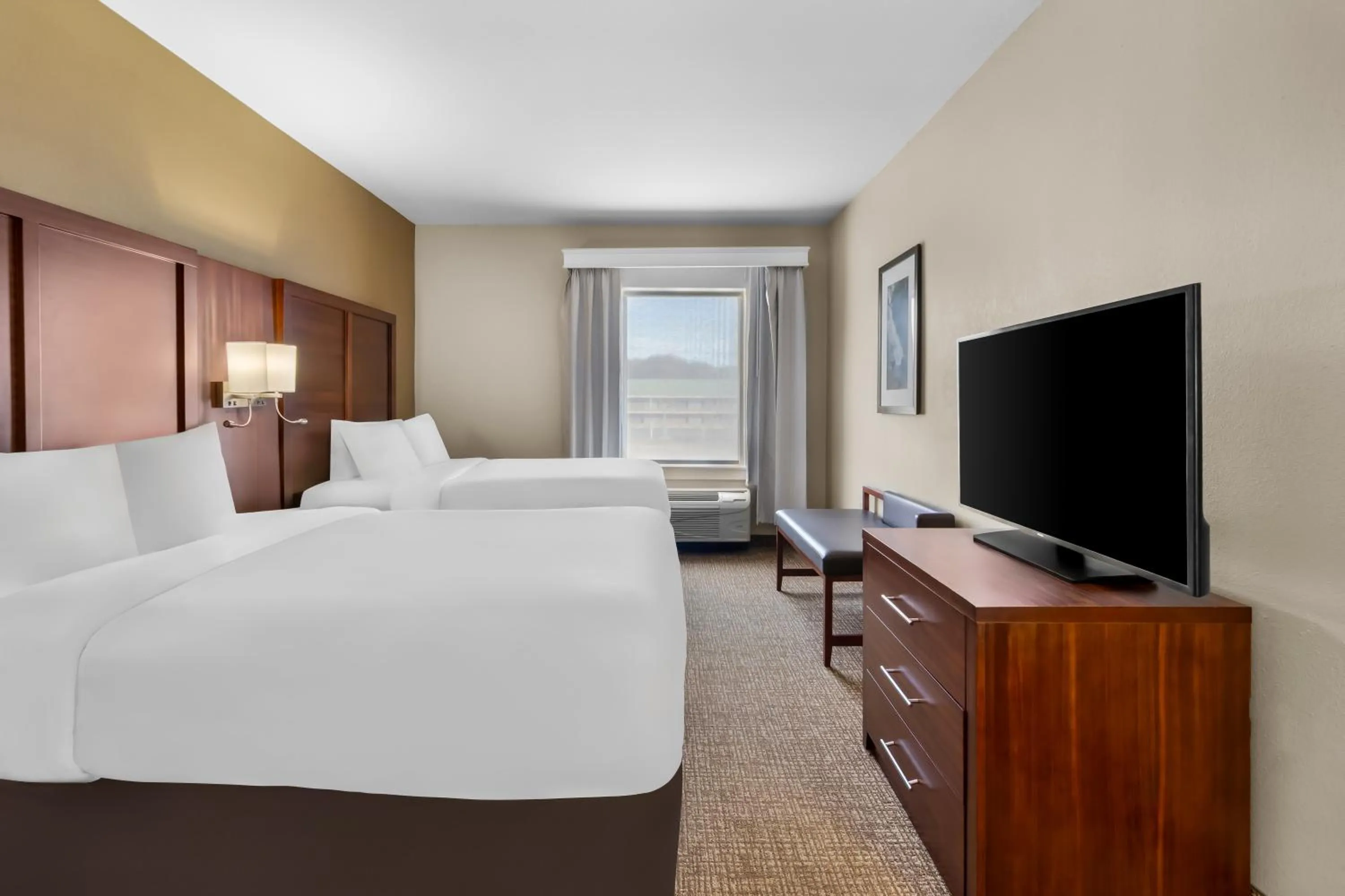 Bed in Comfort Suites At Rivergate Mall