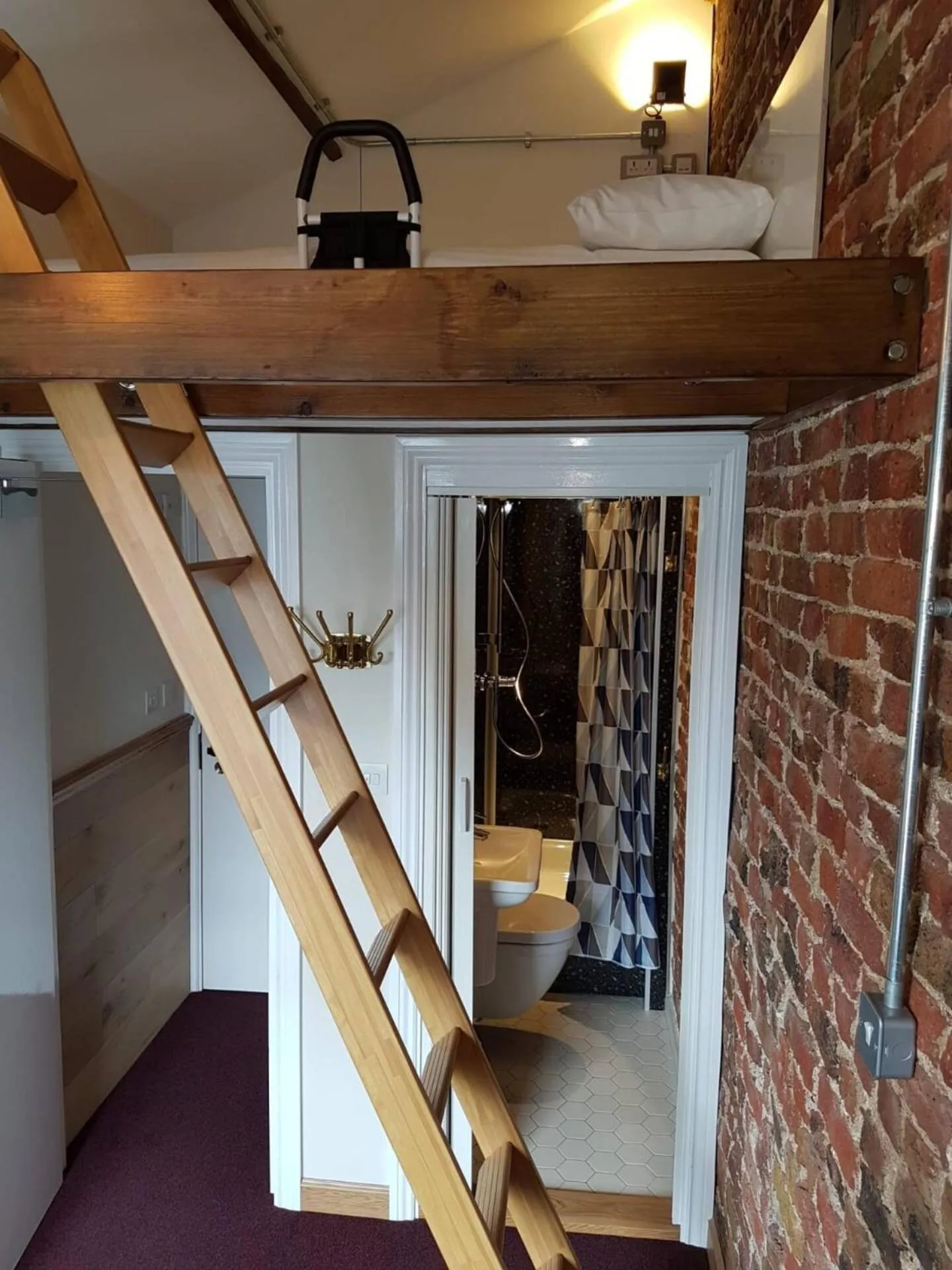 Bed in Victorian Loft Living Hotel 22