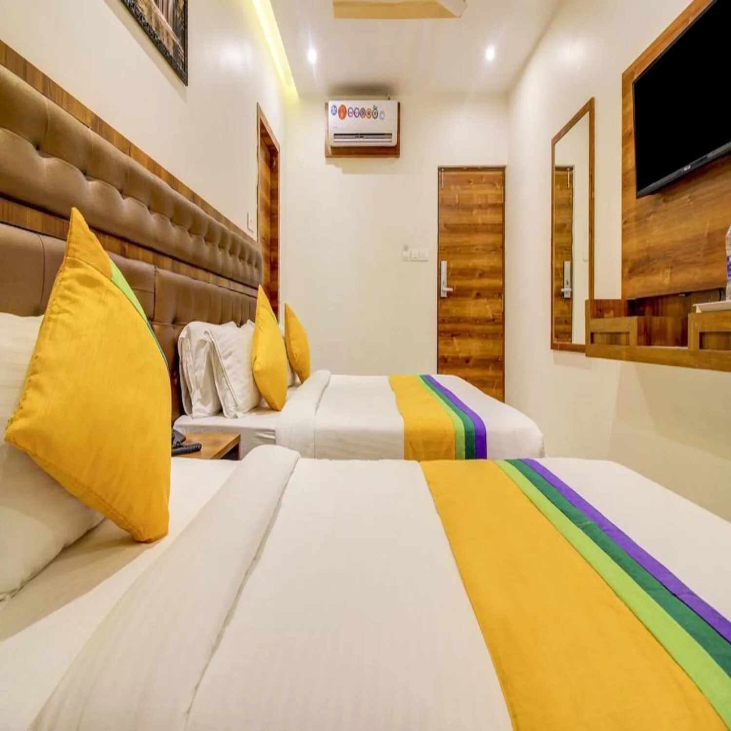 Bed in Hotel Riva International Goregaon- Near NESCO