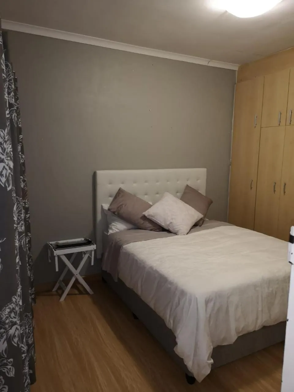 Bed in TwinnPalms Accommodation