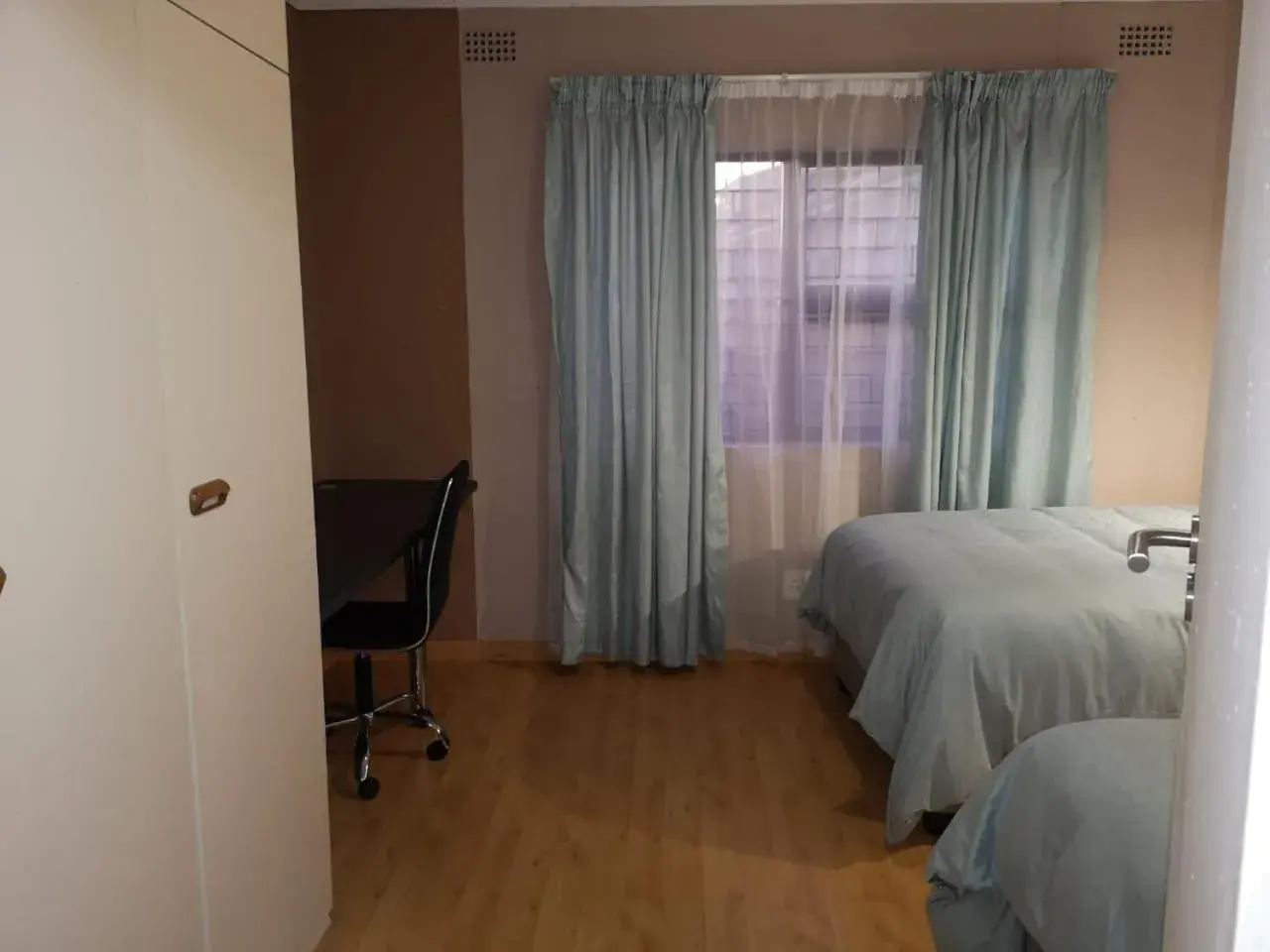 Standard Twin Room with Shared Bathroom in TwinnPalms Accommodation Standard Twin Room with Shared Bathroom in TwinnPalms Accommodation