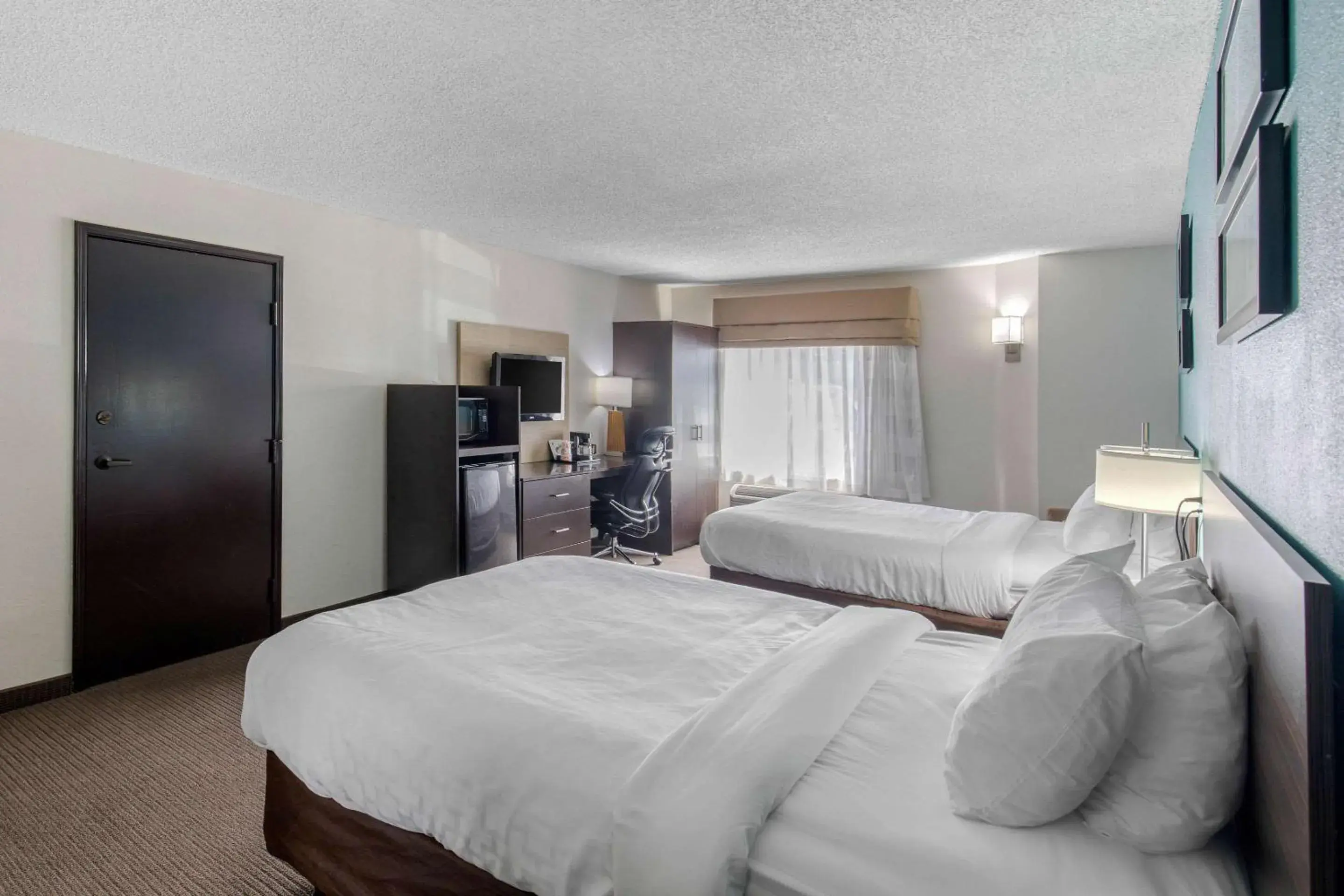 Photo of the whole room, Bed in Clarion Inn & Suites DFW North Photo of the whole room, Bed in Clarion Inn & Suites DFW North