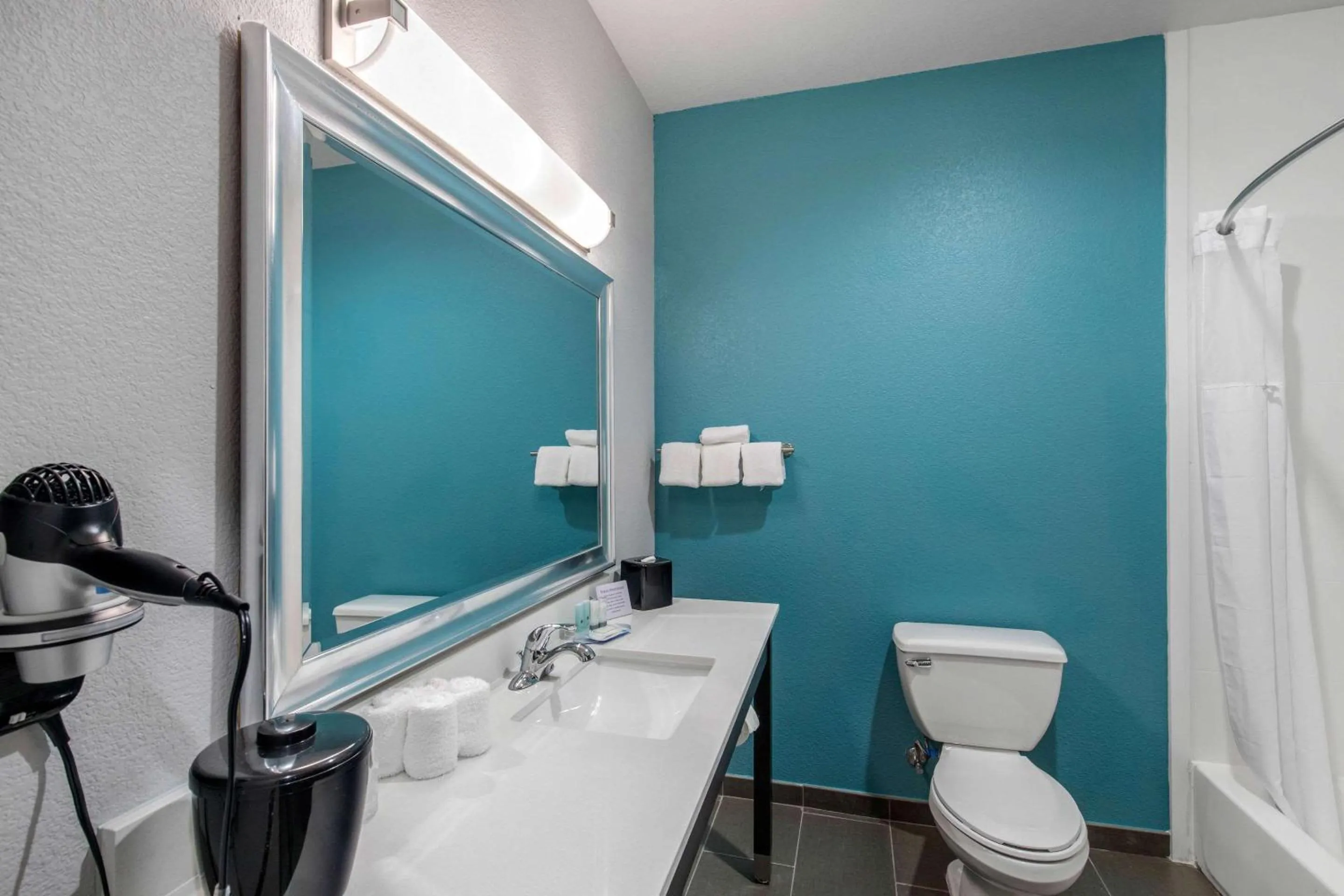 Bedroom in Clarion Inn & Suites DFW North