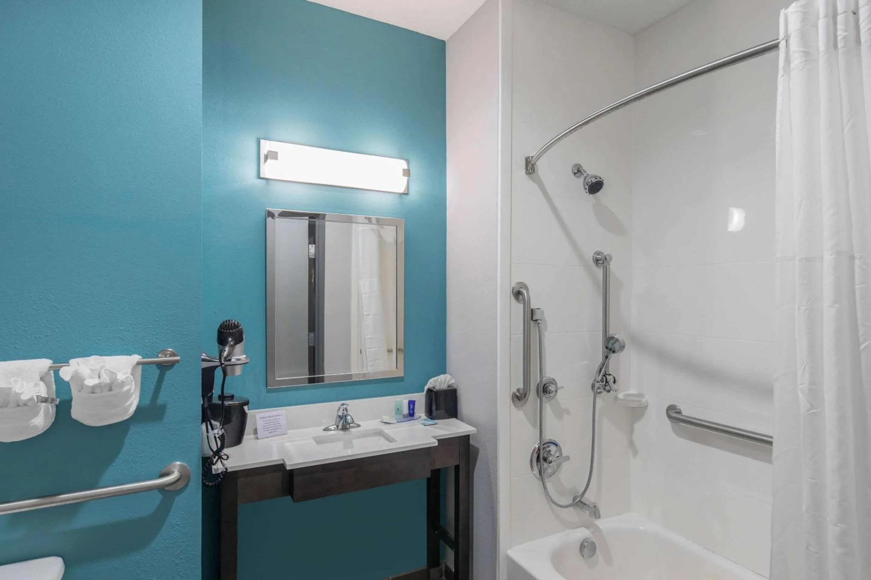 Bedroom in Clarion Inn & Suites DFW North