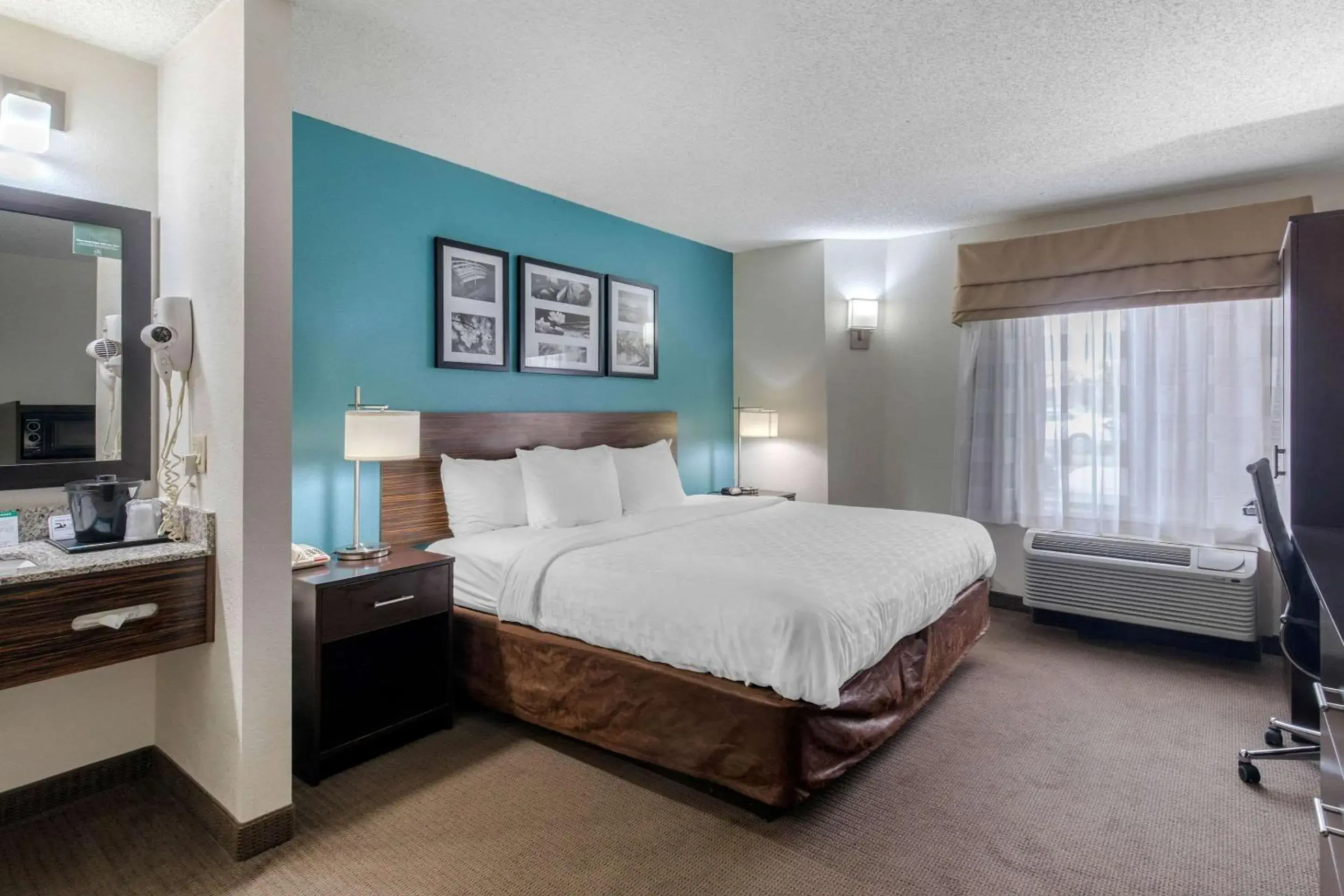 Photo of the whole room, Bed in Clarion Inn & Suites DFW North Photo of the whole room, Bed in Clarion Inn & Suites DFW North