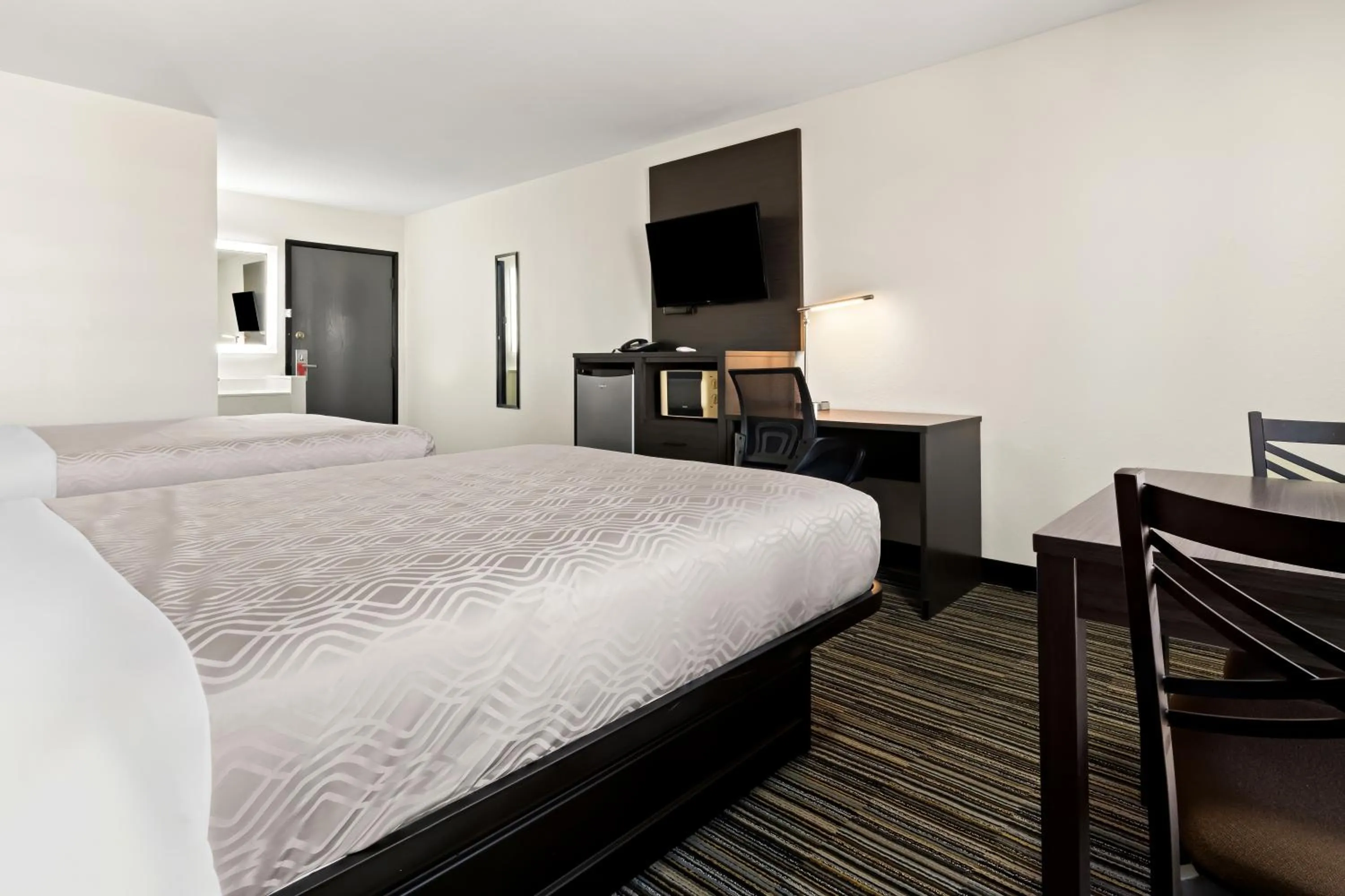 Bed in Econo Lodge Dumas