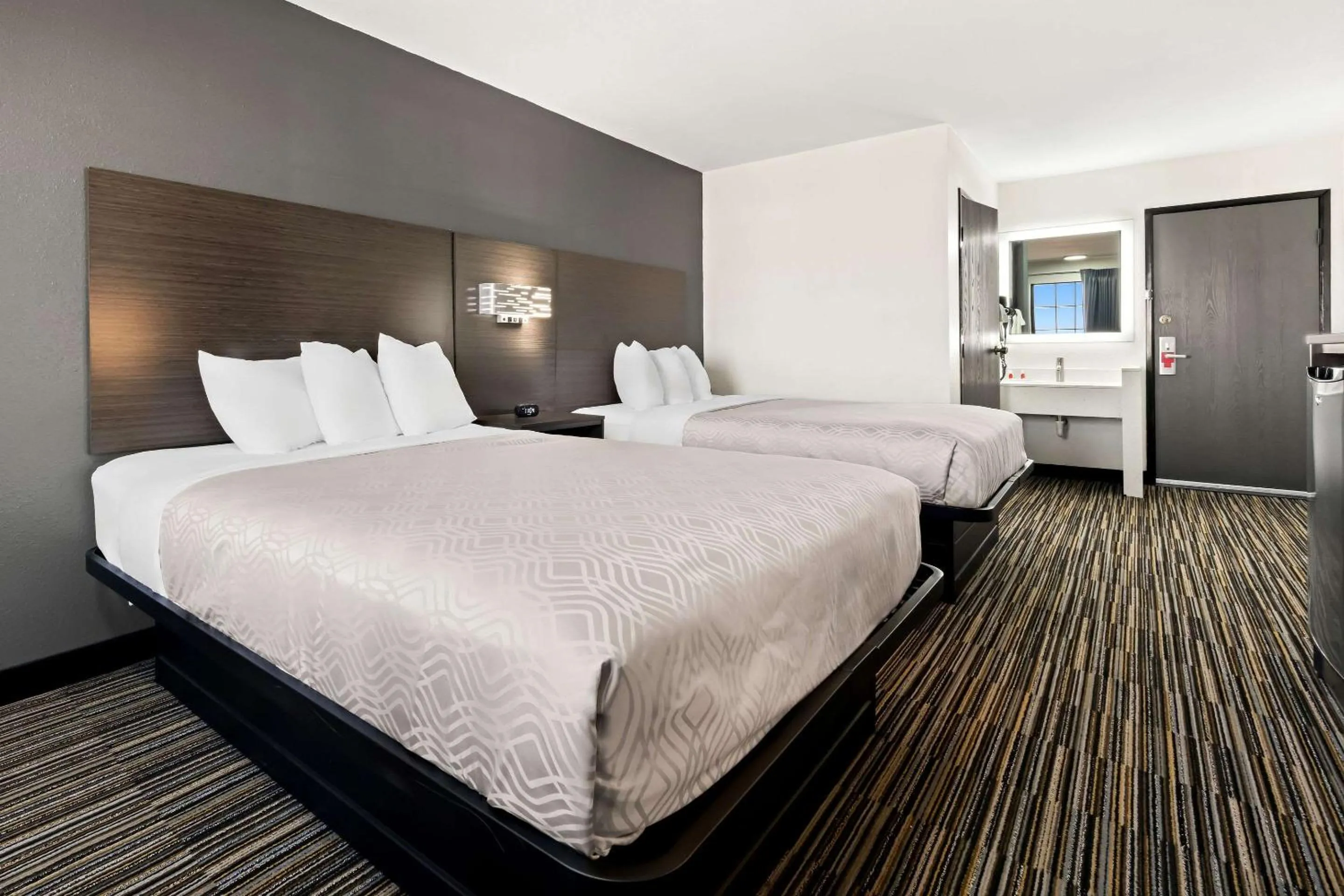 Bedroom, Bed in Econo Lodge Dumas