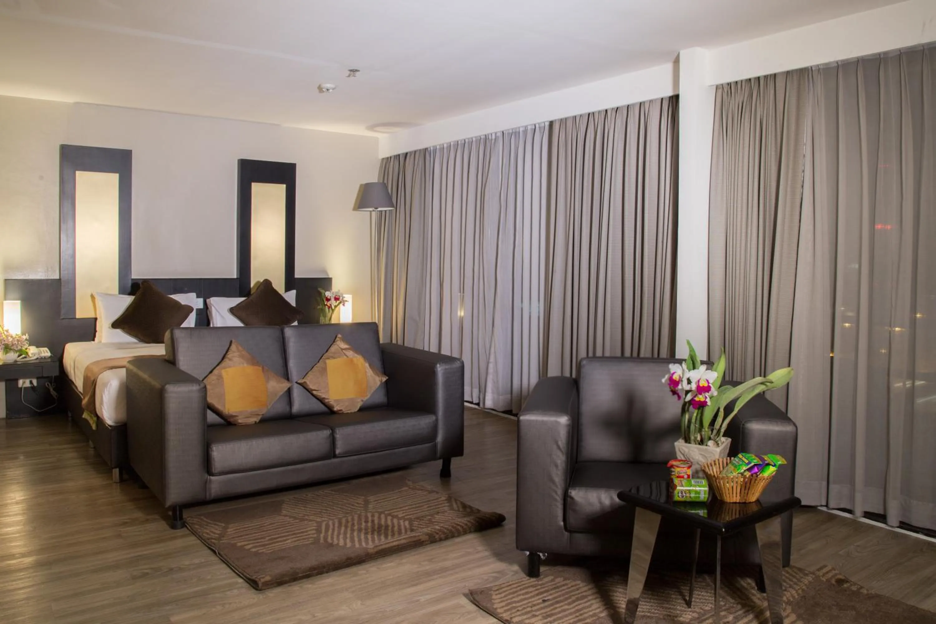 Bed in Gold Orchid Bangkok Hotel