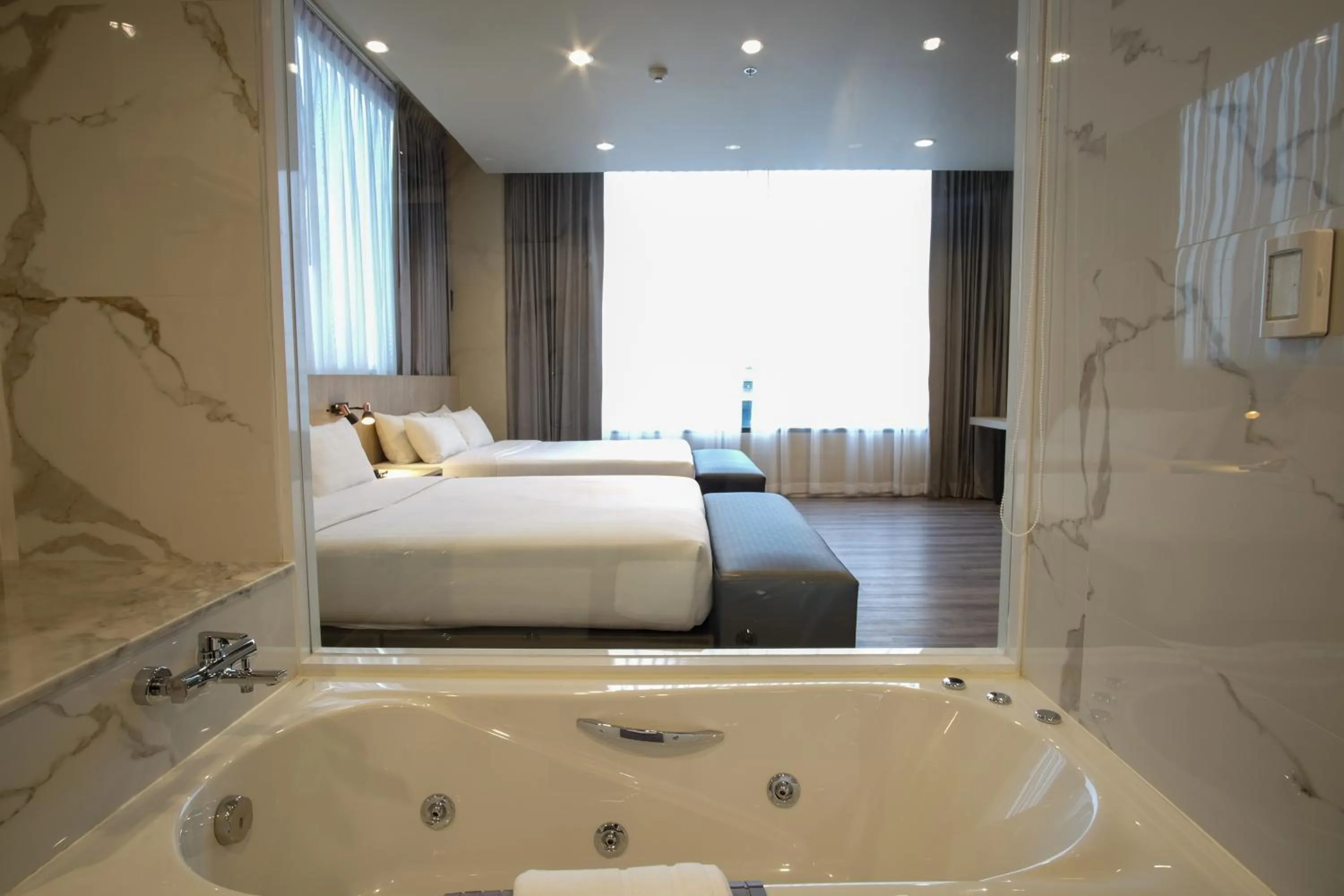 Bed in Gold Orchid Bangkok Hotel