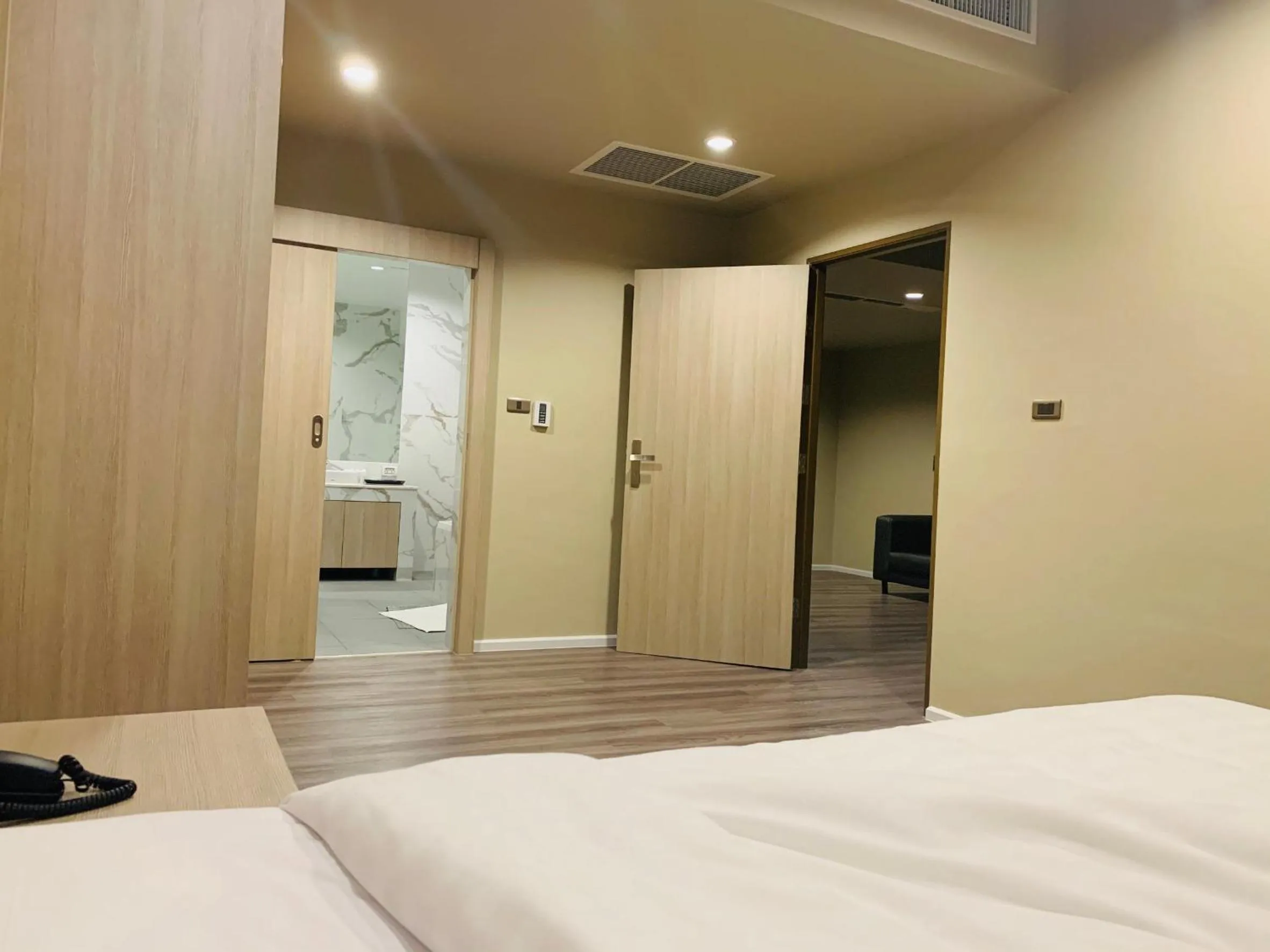 Bed in Gold Orchid Bangkok Hotel