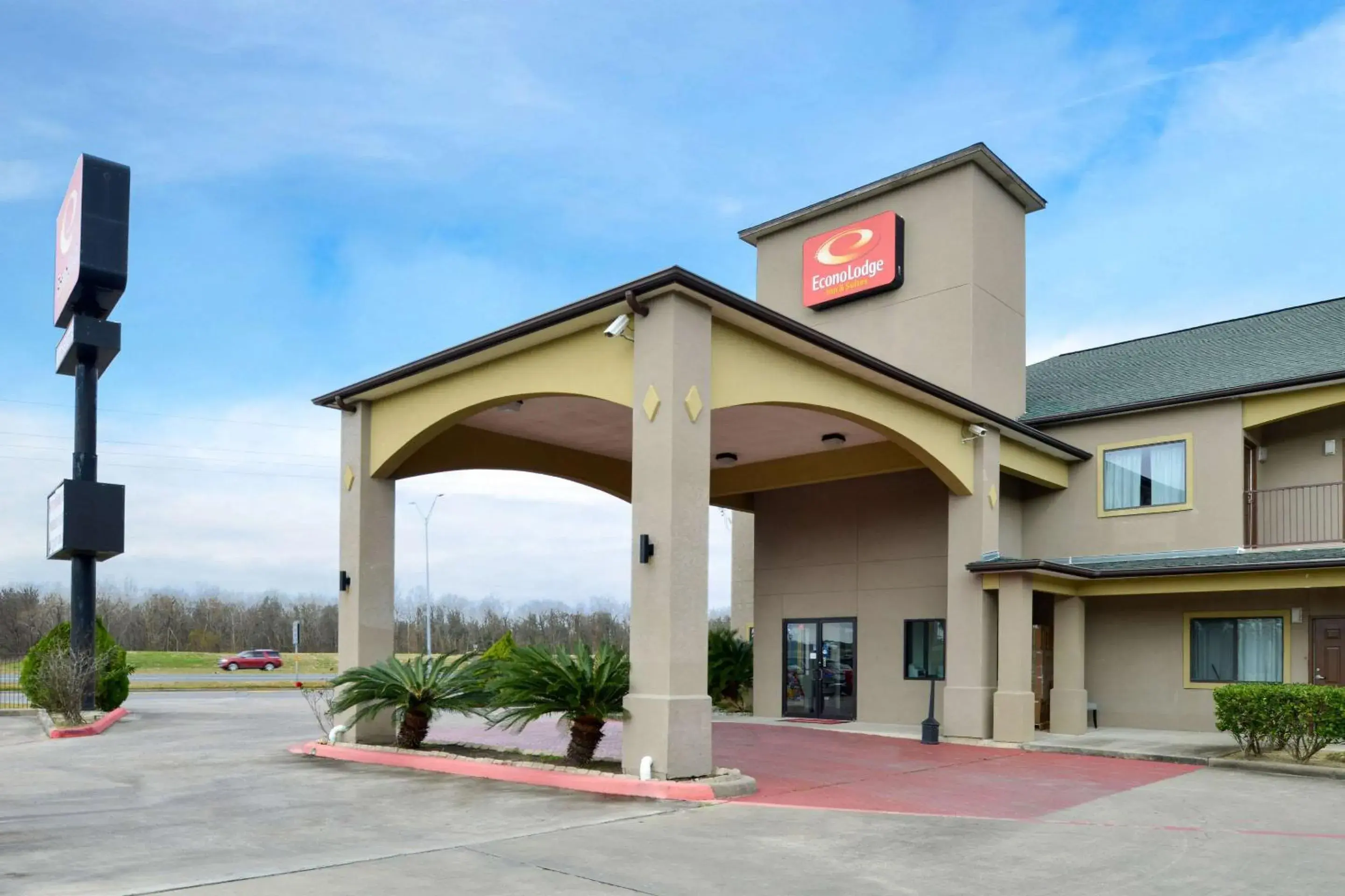 Property building in Econo Lodge Inn & Suites Port Arthur near Sabine Pass Property building in Econo Lodge Inn & Suites Port Arthur near Sabine Pass