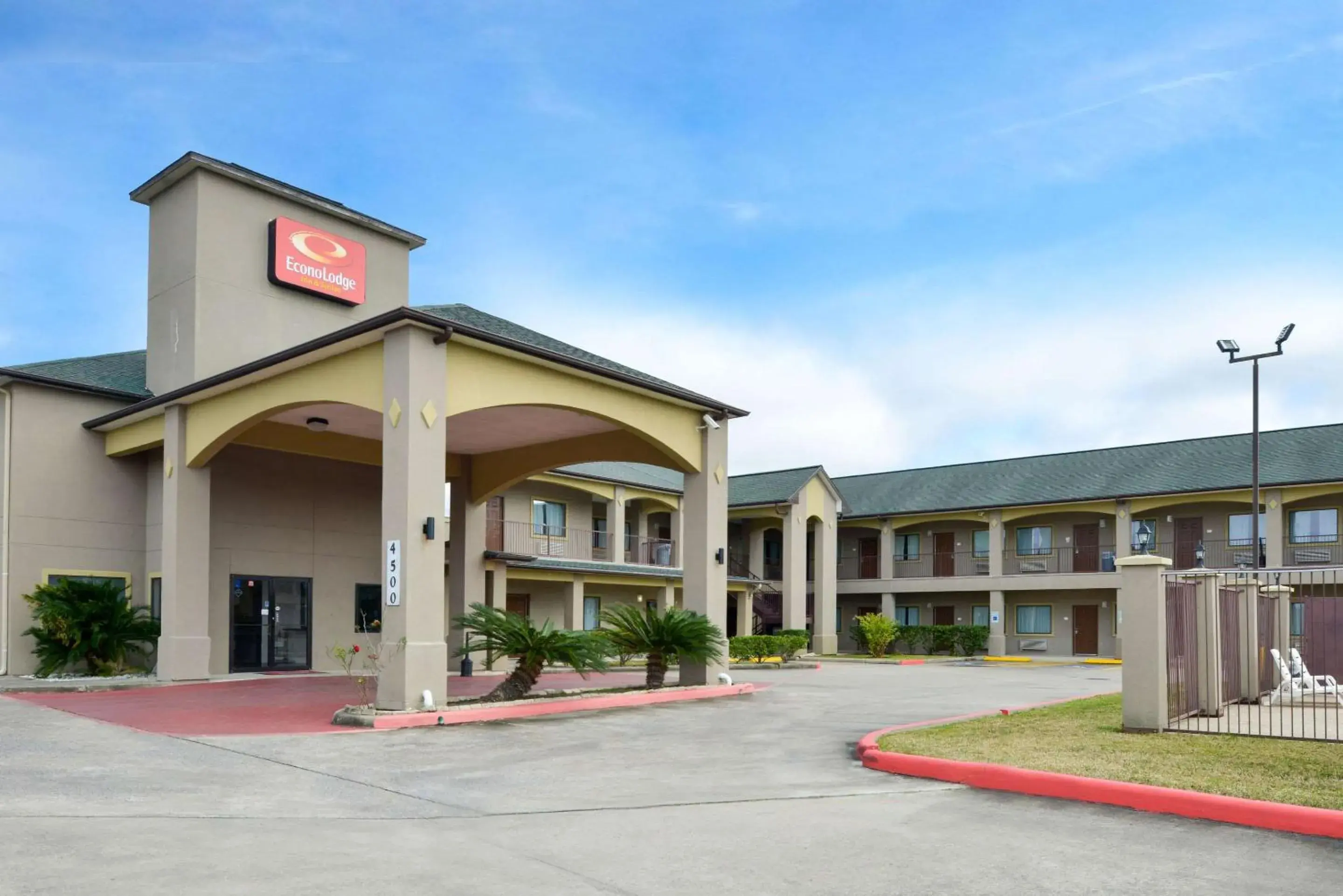 Property building in Econo Lodge Inn & Suites Port Arthur near Sabine Pass Property building in Econo Lodge Inn & Suites Port Arthur near Sabine Pass