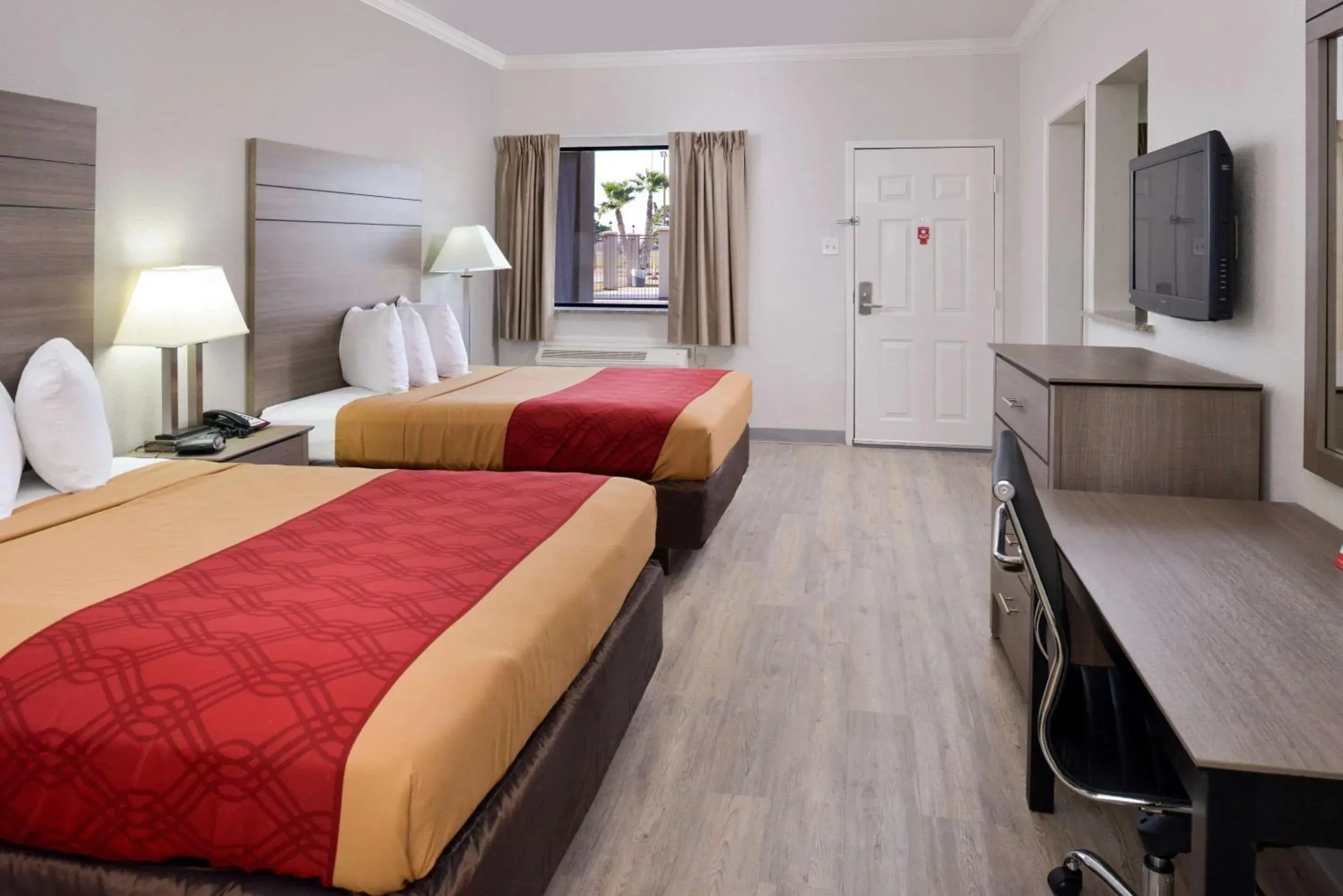 Photo of the whole room, Bed in Econo Lodge Inn & Suites Port Arthur near Sabine Pass Photo of the whole room, Bed in Econo Lodge Inn & Suites Port Arthur near Sabine Pass