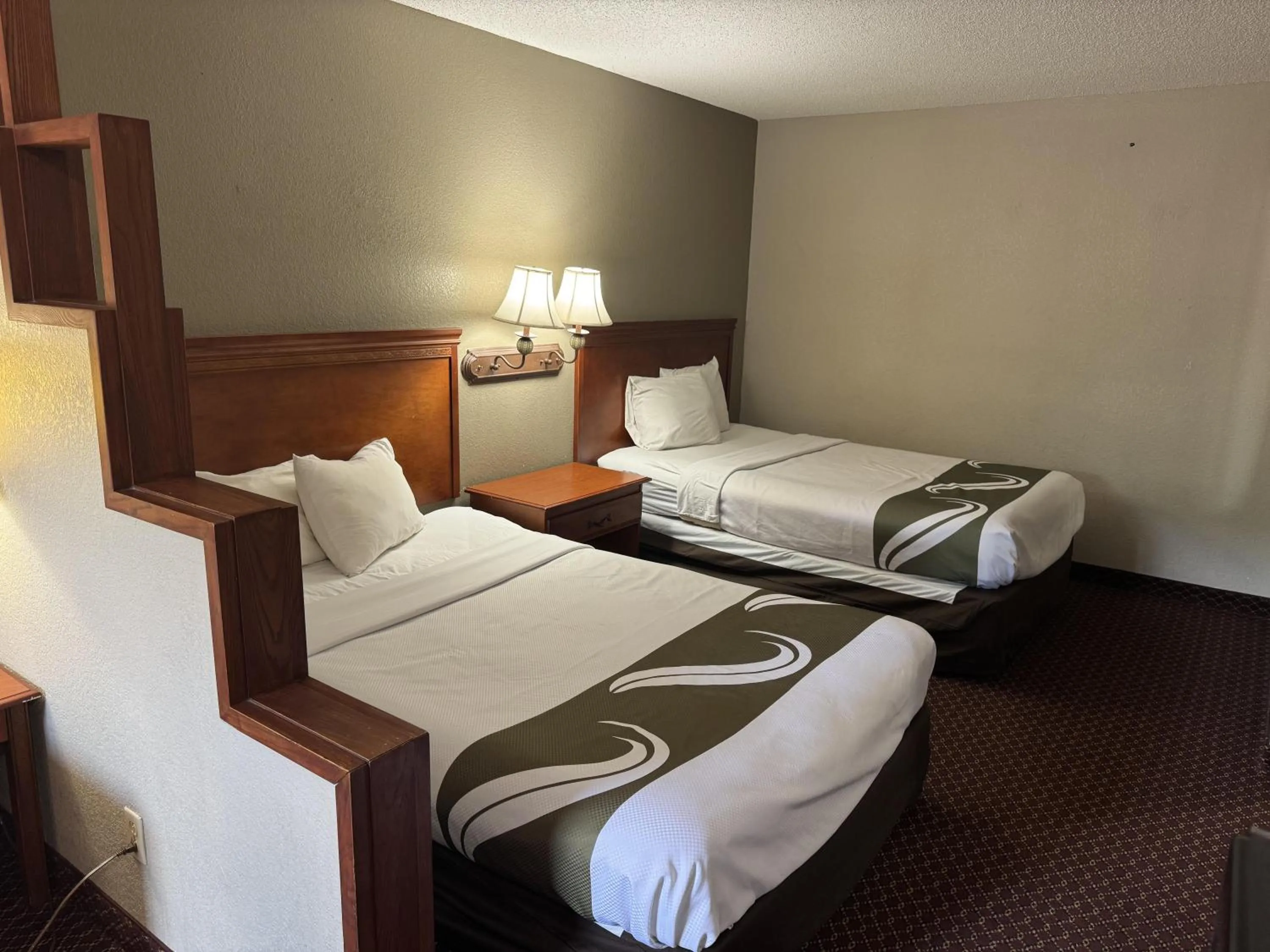 Bedroom, Bed in Rodeway Inn & Suites South of Fiesta Park