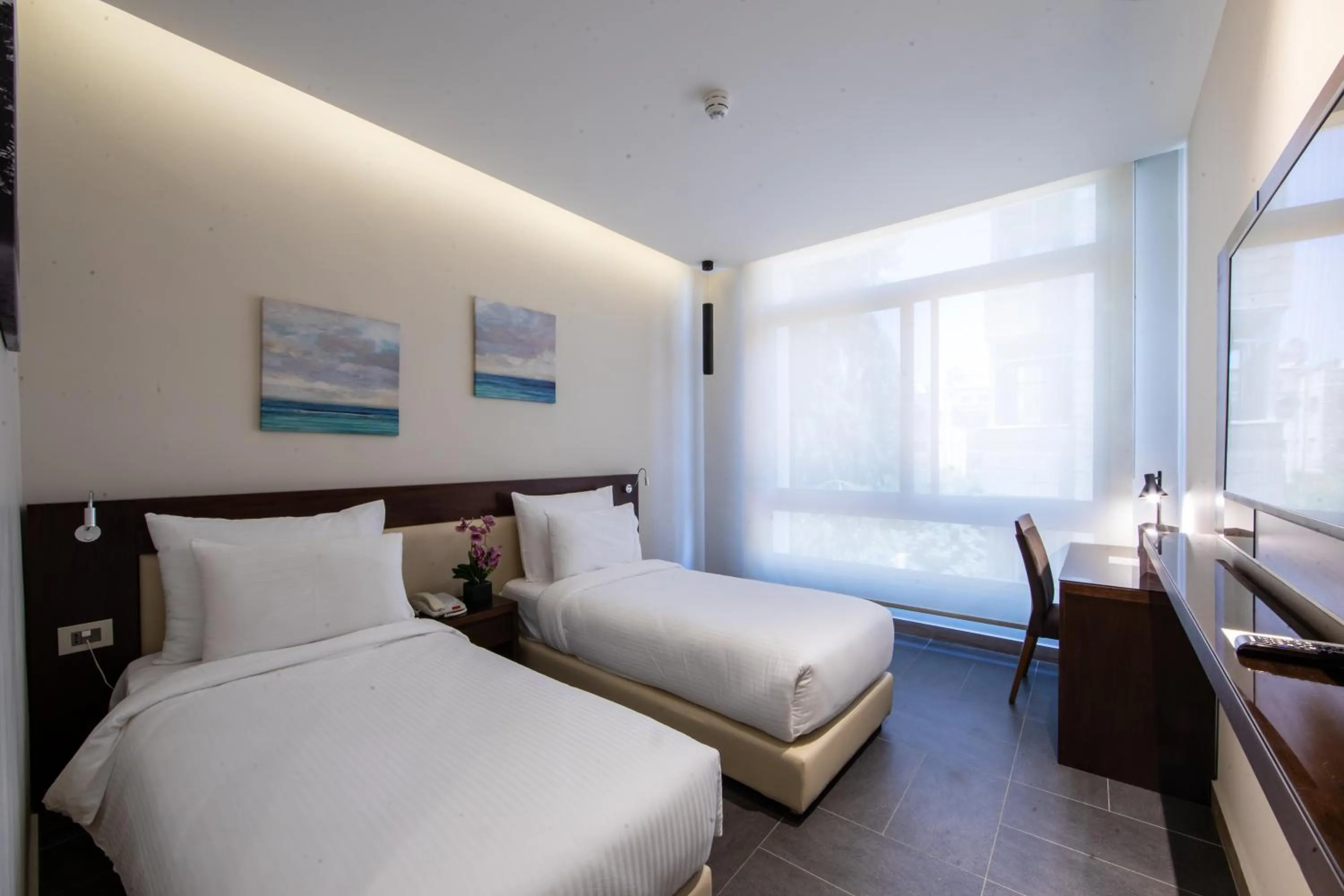 Bed in The Compass Hotel