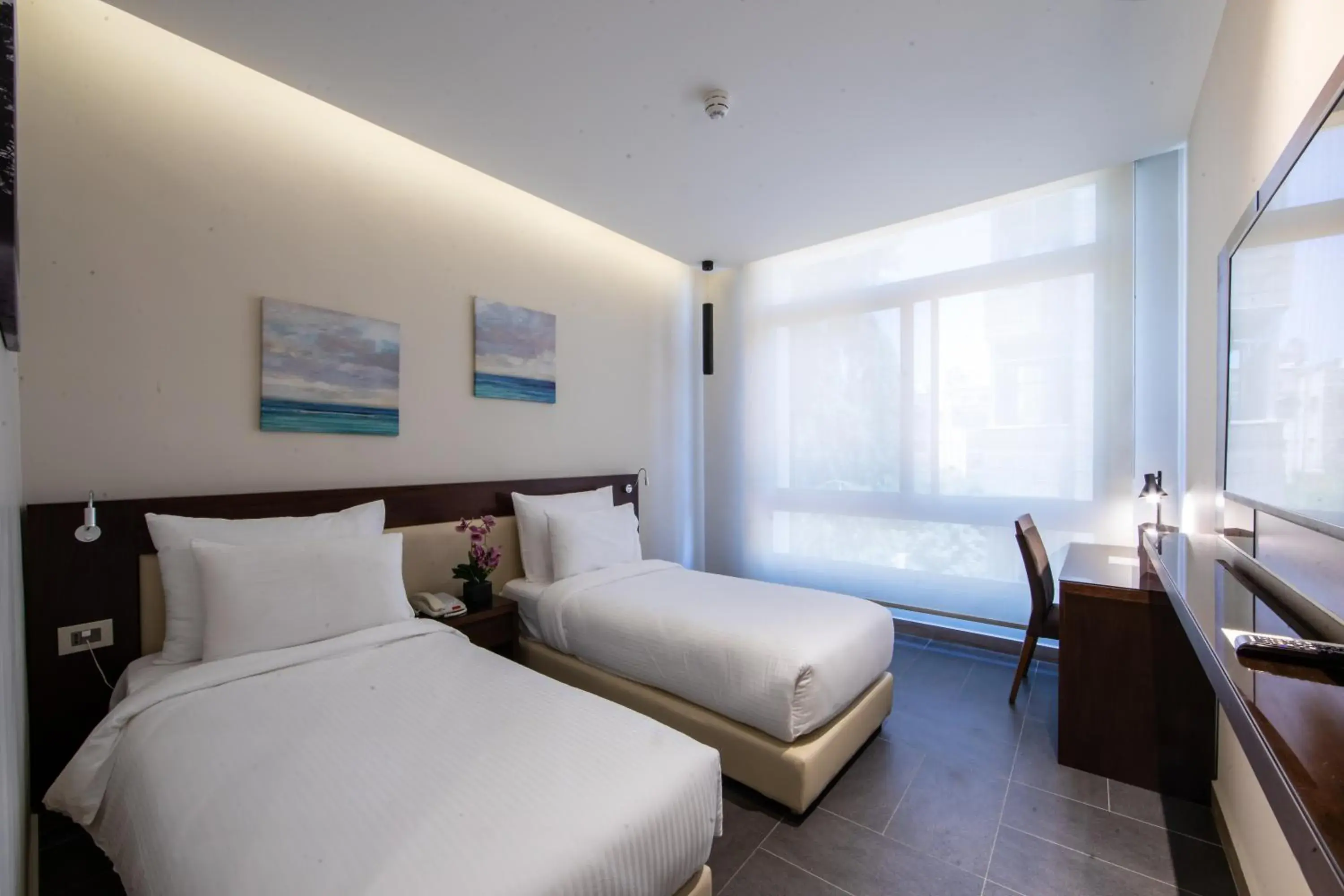 Bed in The Compass Hotel Bed in The Compass Hotel