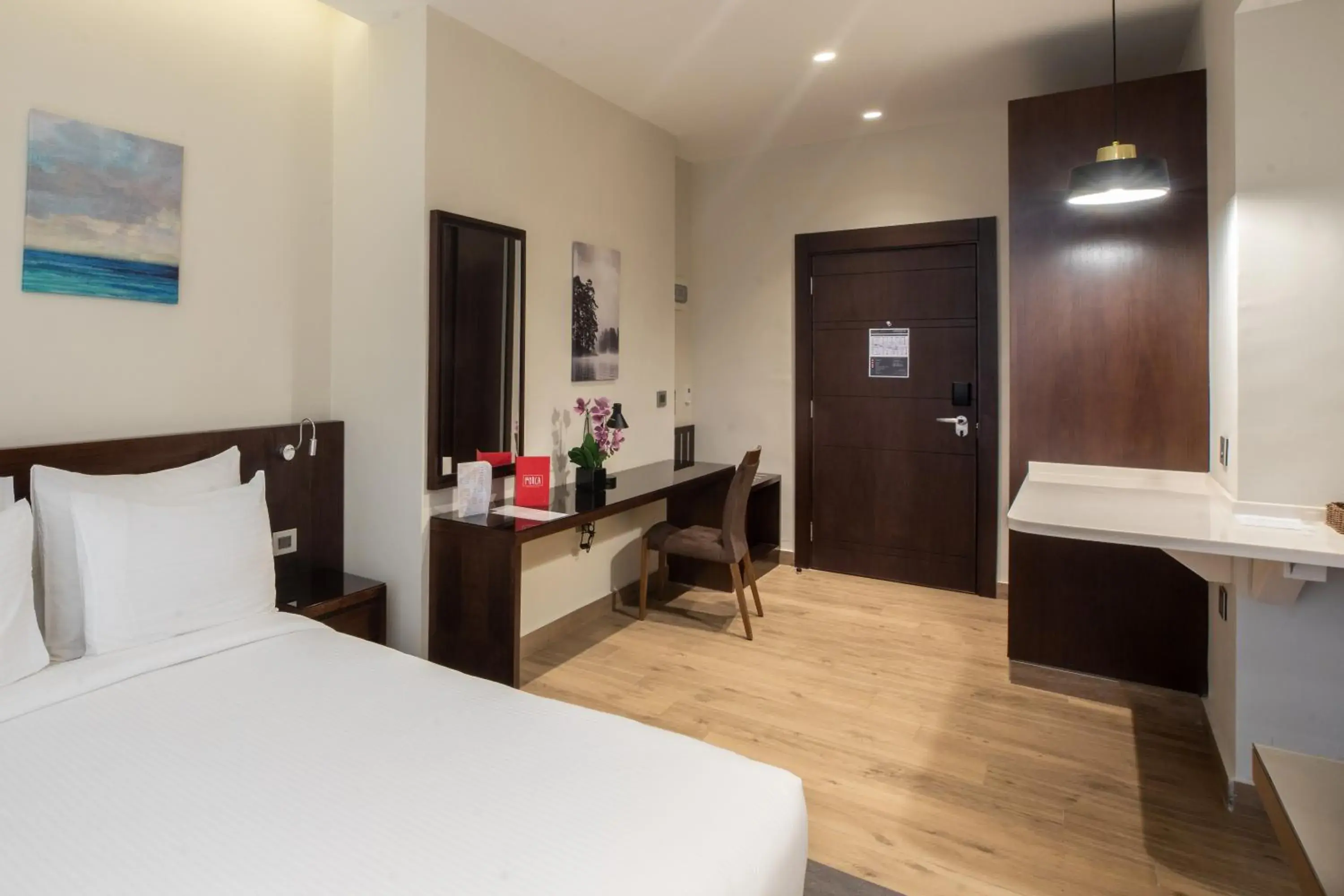 View (from property/room), Bed in The Compass Hotel View (from property/room), Bed in The Compass Hotel