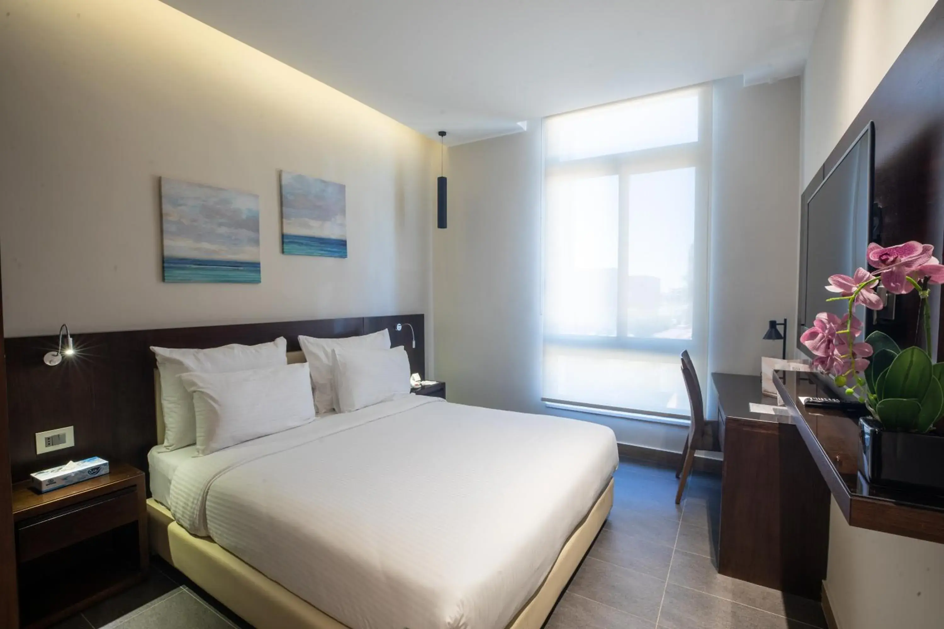 Bed in The Compass Hotel Bed in The Compass Hotel