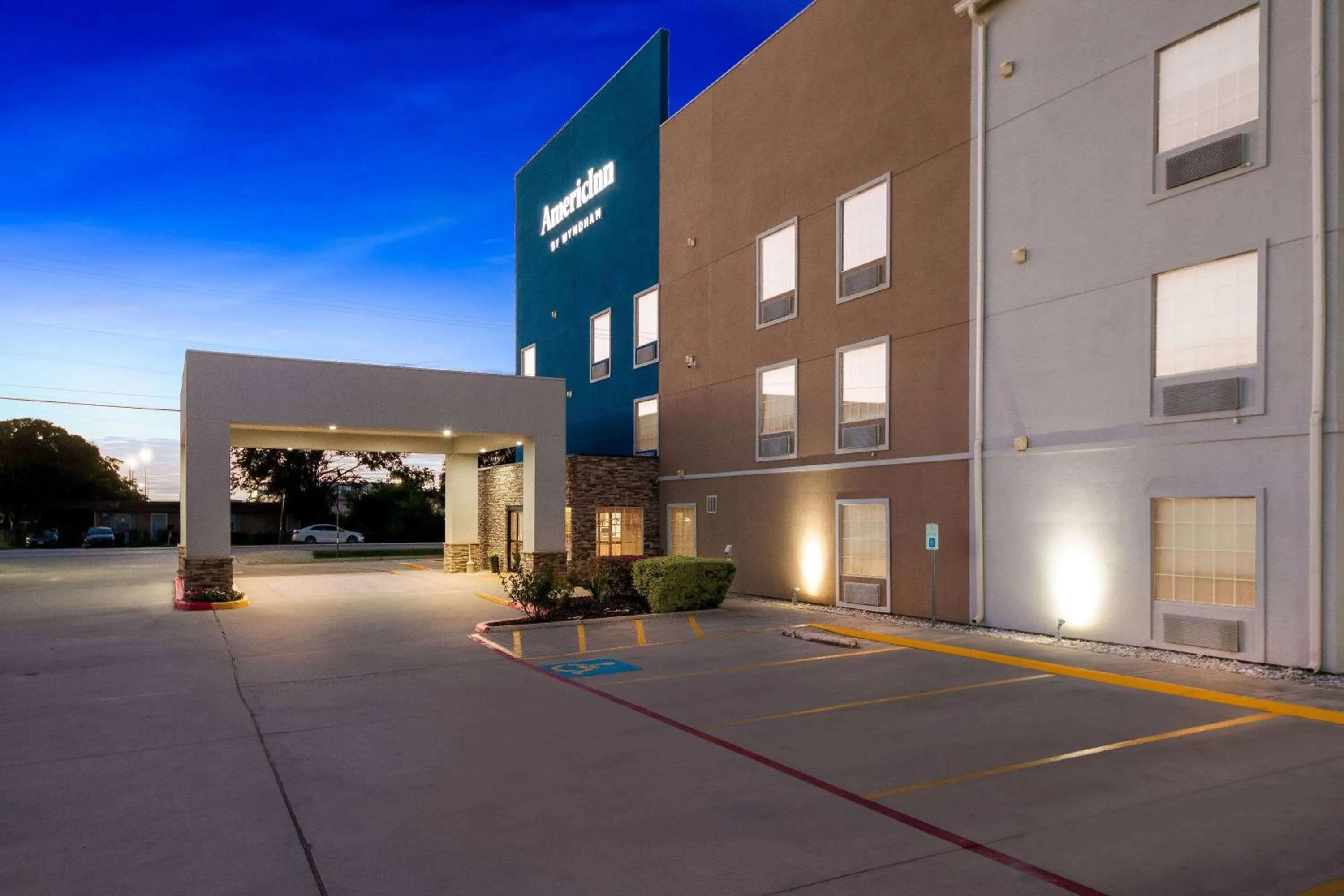 Property building in AmericInn by Wyndham New Braunfels