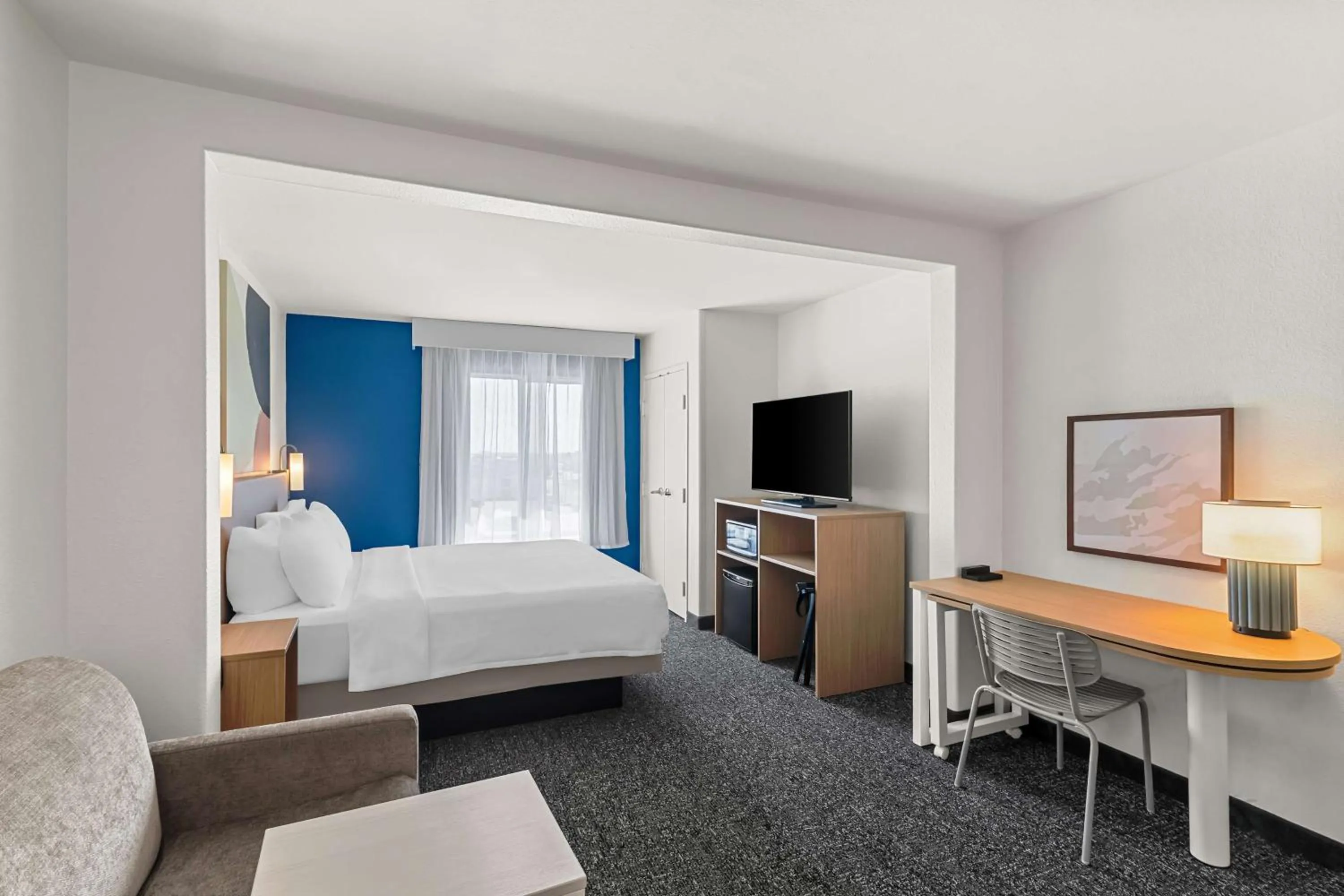 Living room, Bed in Sleep Inn & Suites Near Fort Cavazos