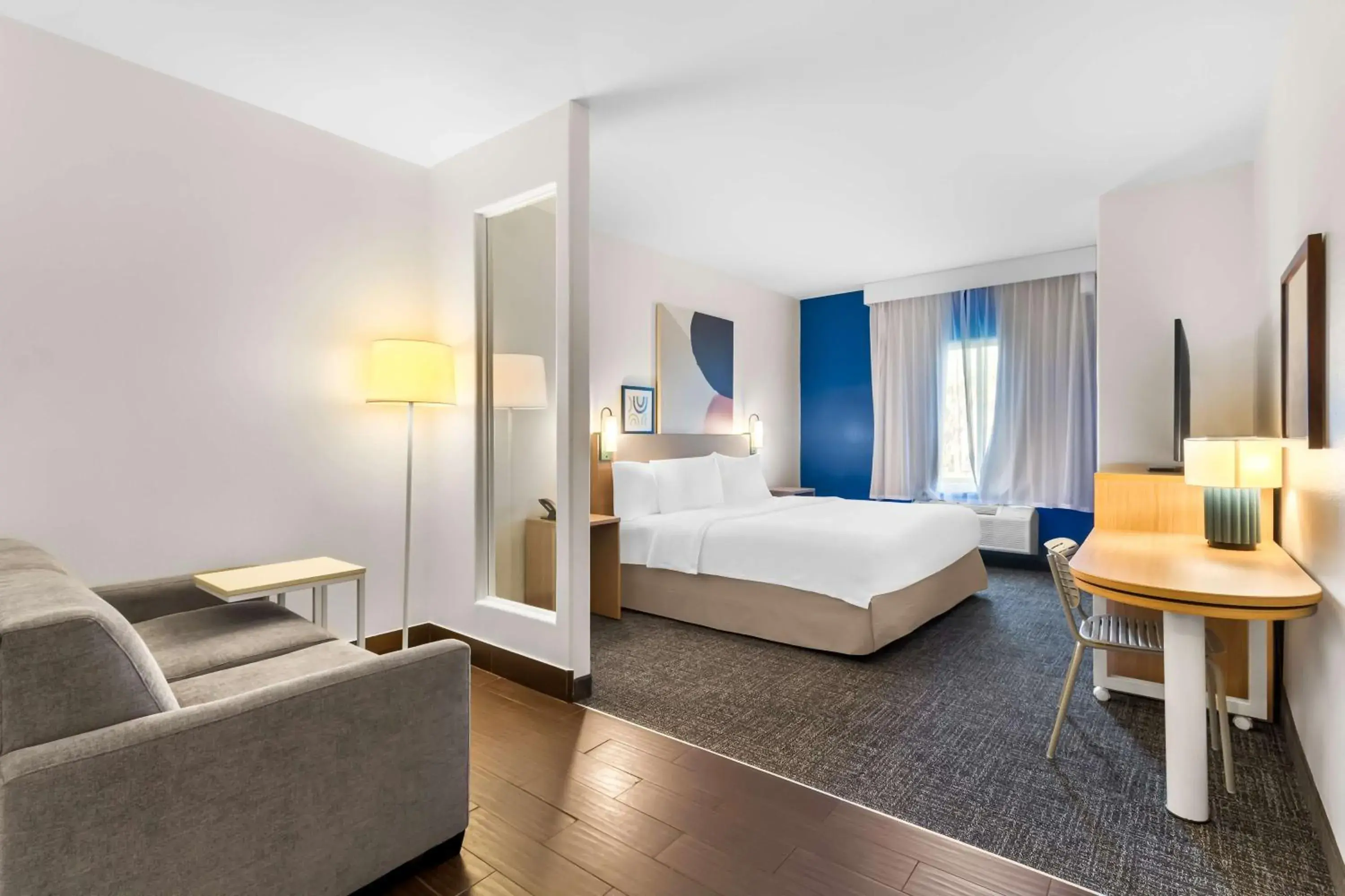 Living room, Bed in Spark by Hilton Pearland Living room, Bed in Spark by Hilton Pearland