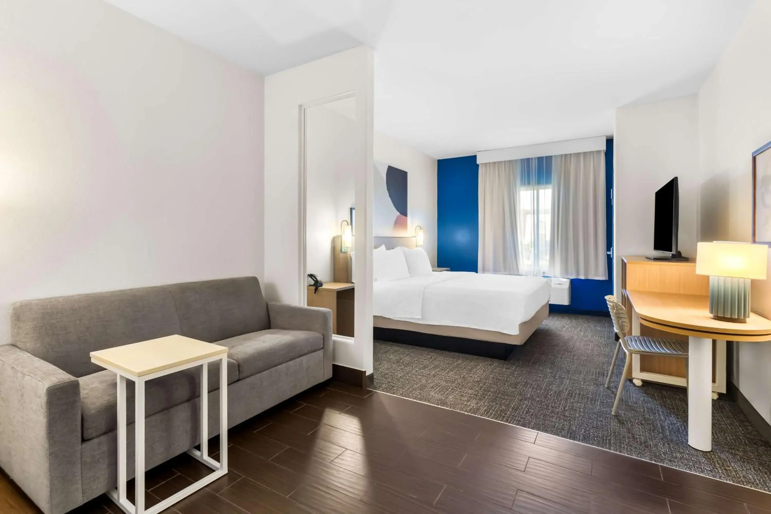 Living room, Bed in Spark by Hilton Pearland Living room, Bed in Spark by Hilton Pearland