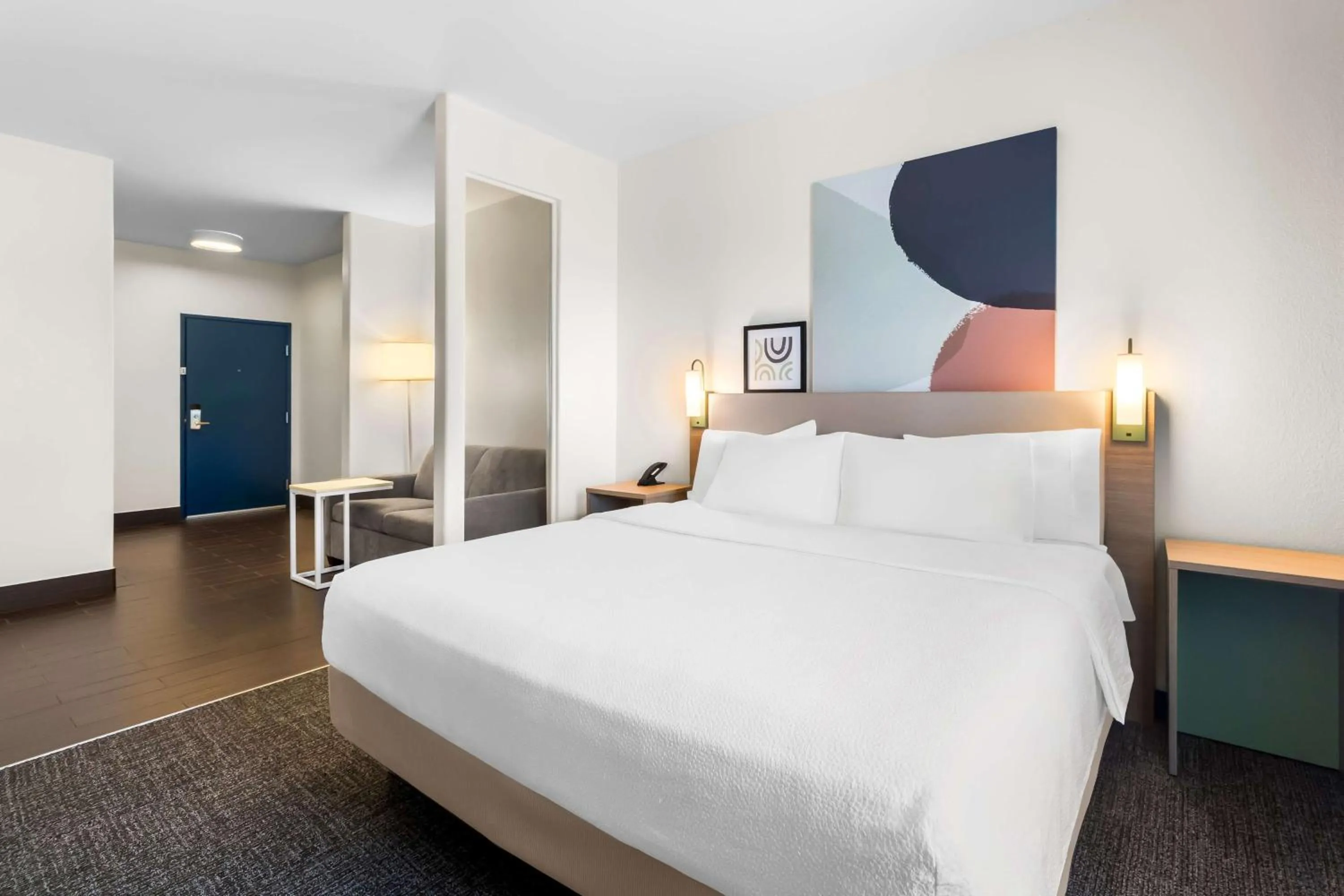 Living room, Bed in Spark by Hilton Pearland