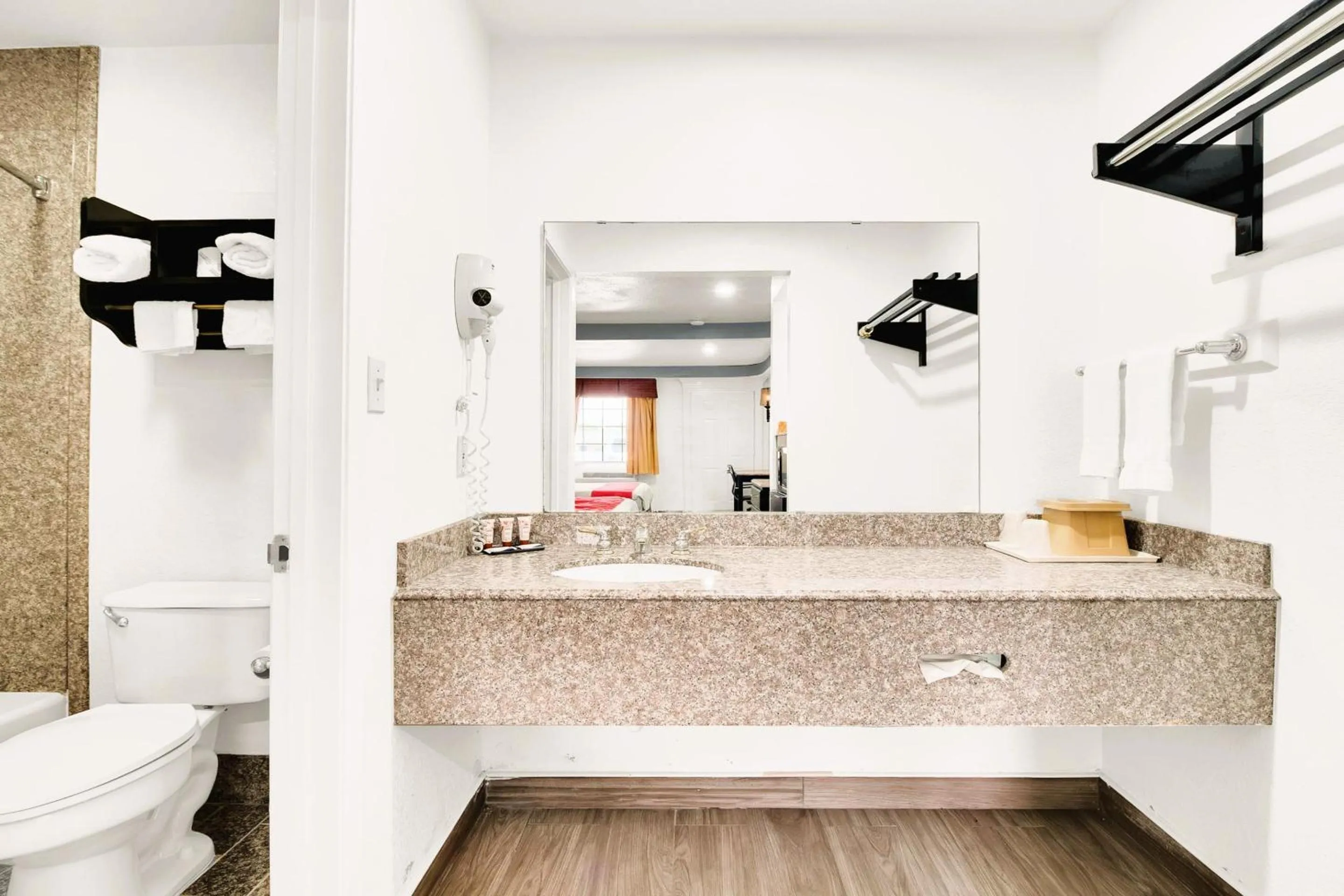 Bathroom in Three Rivers Executive Inn & Suites By OYO
