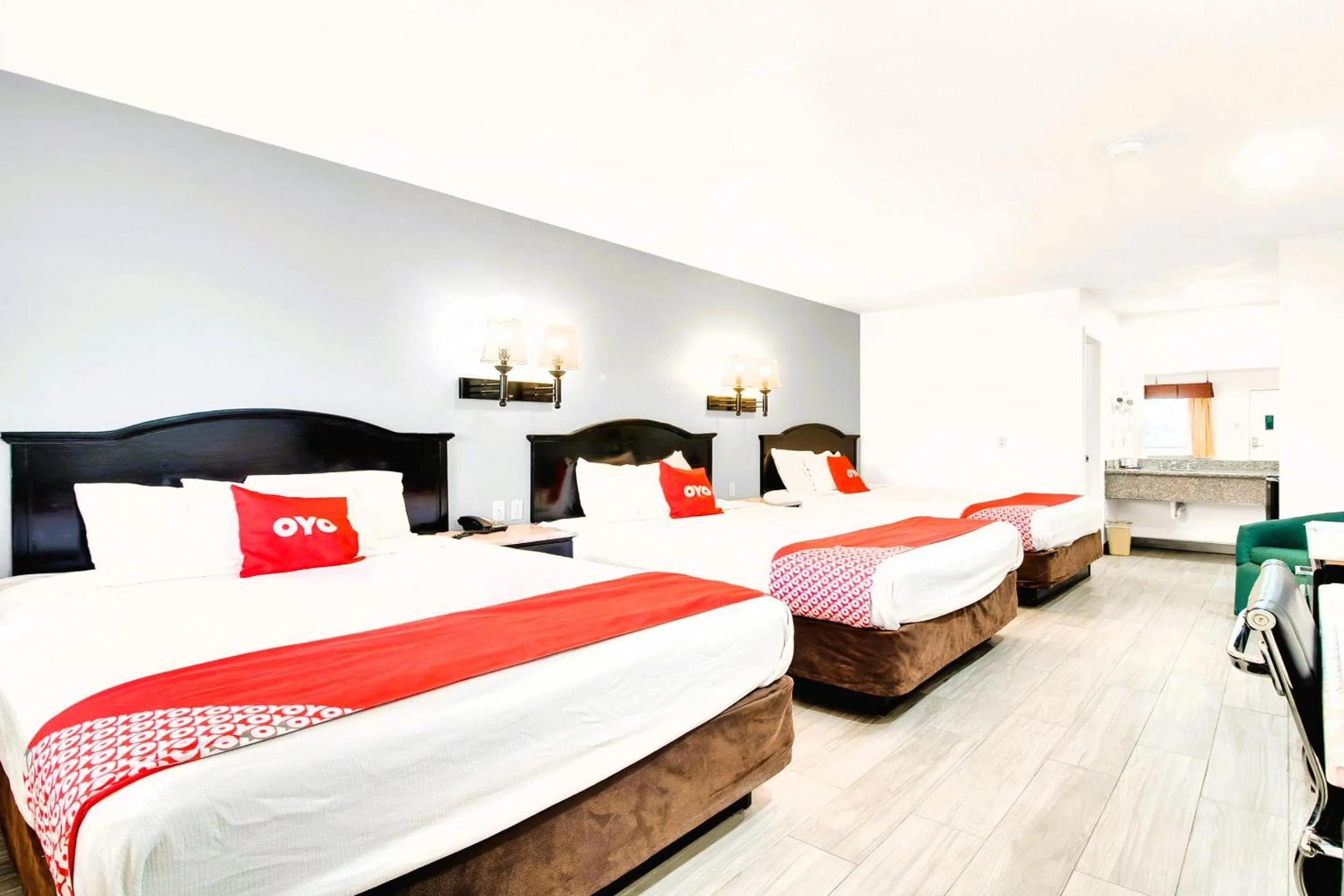 Bedroom, Bed in Three Rivers Executive Inn & Suites By OYO