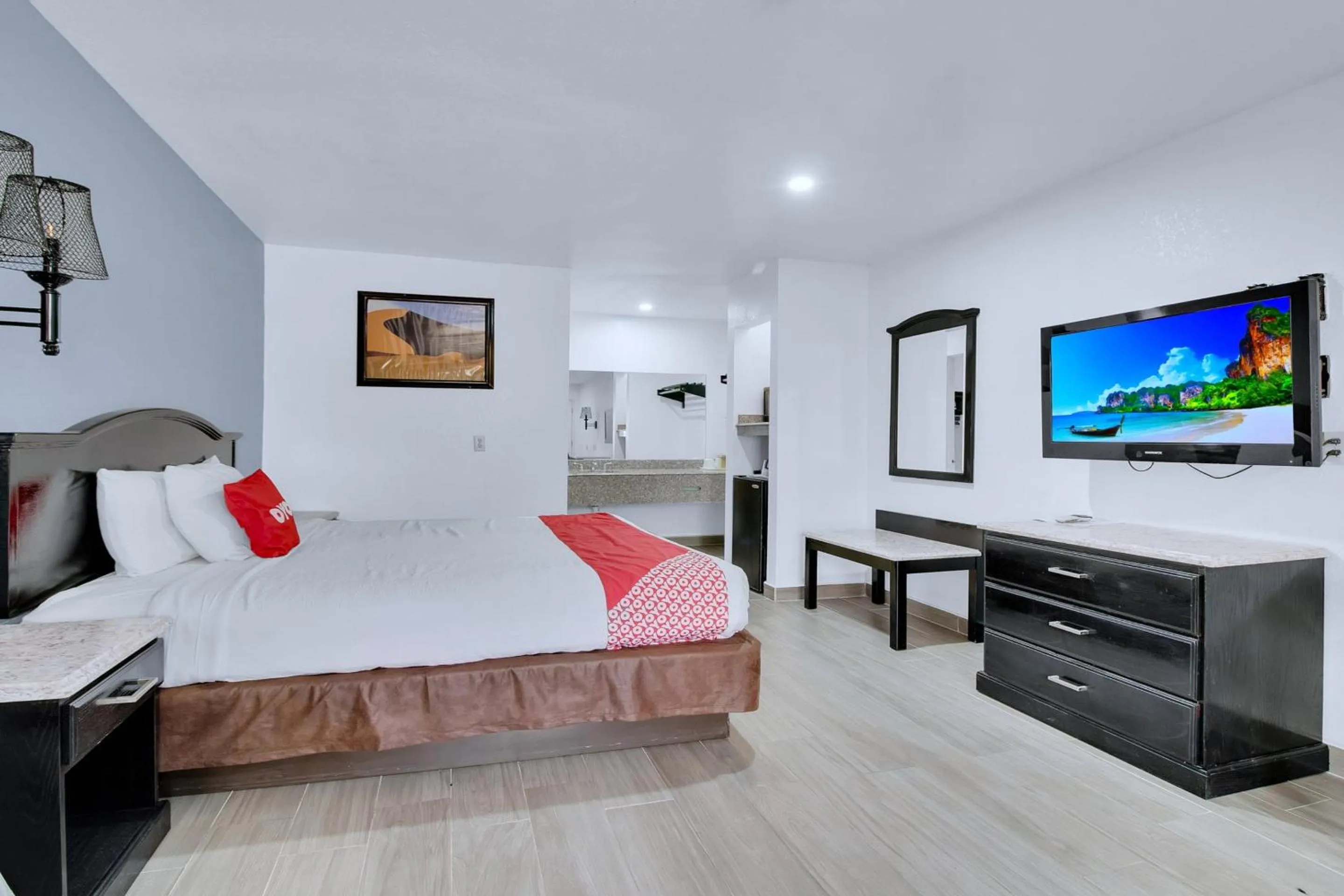 Bedroom, Bed in Three Rivers Executive Inn & Suites By OYO