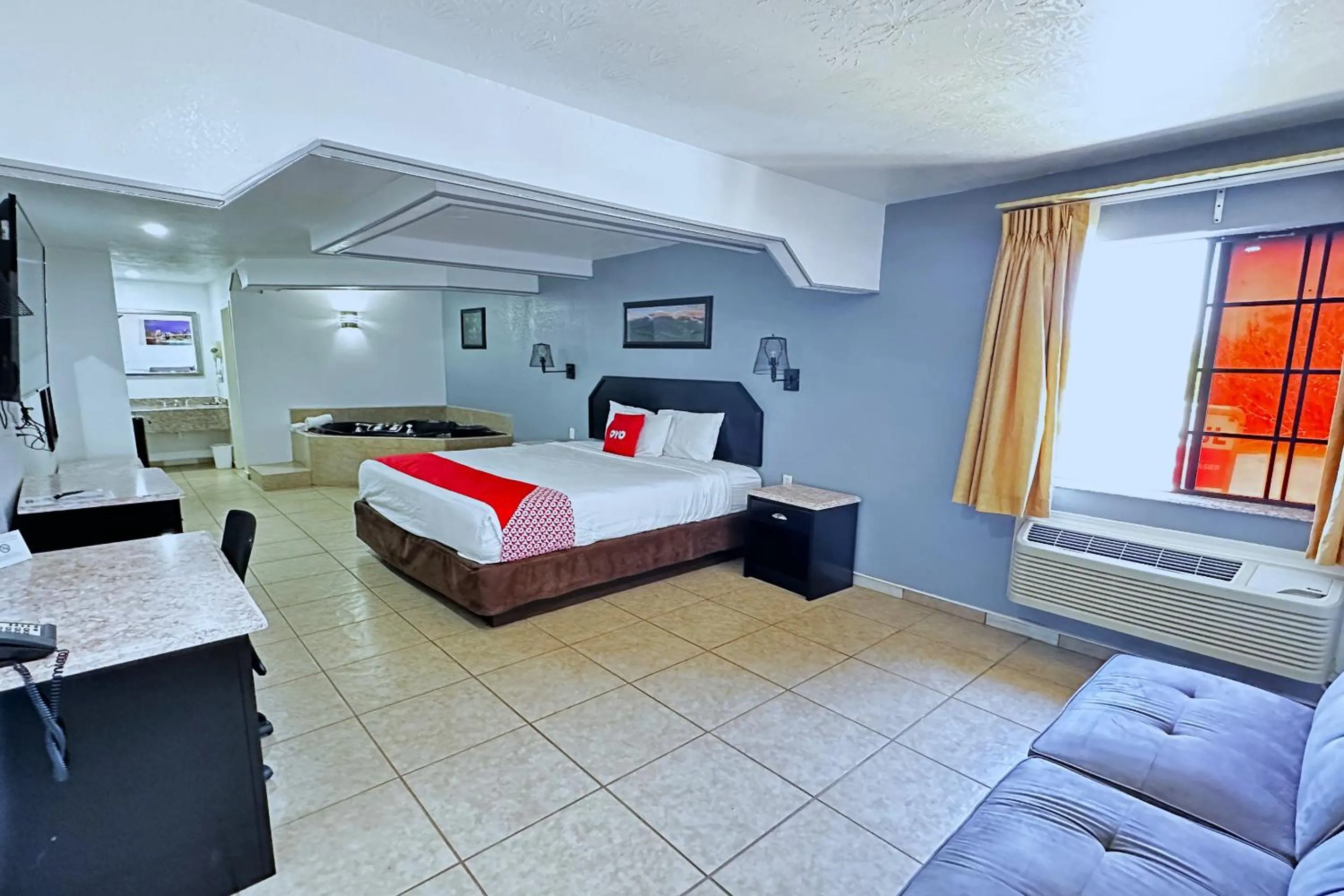 Bedroom, Bed in Three Rivers Executive Inn & Suites By OYO