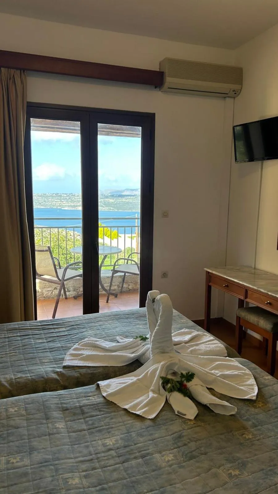 Bed in Areti Aparthotel