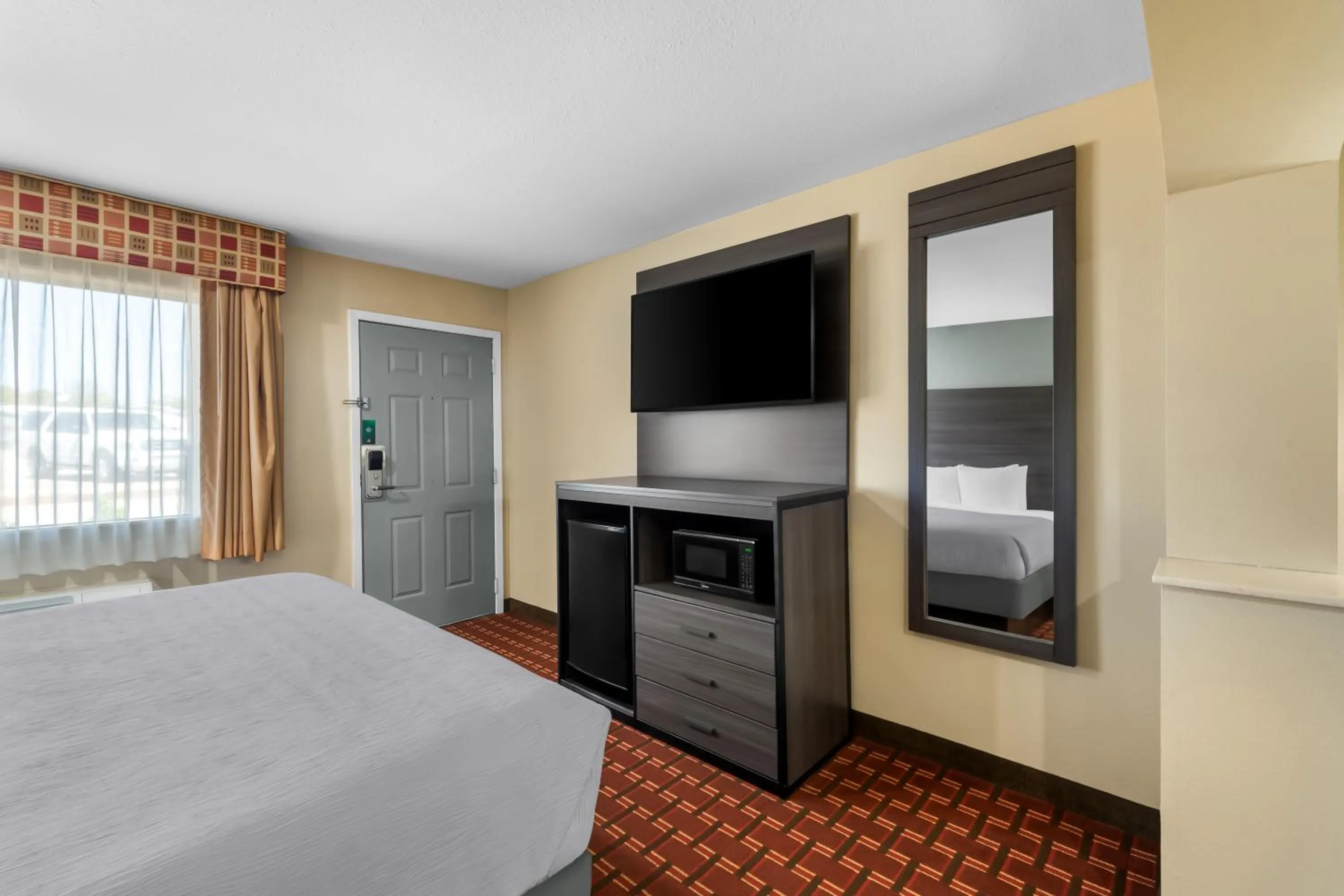 Bed in Quality Inn Marshall