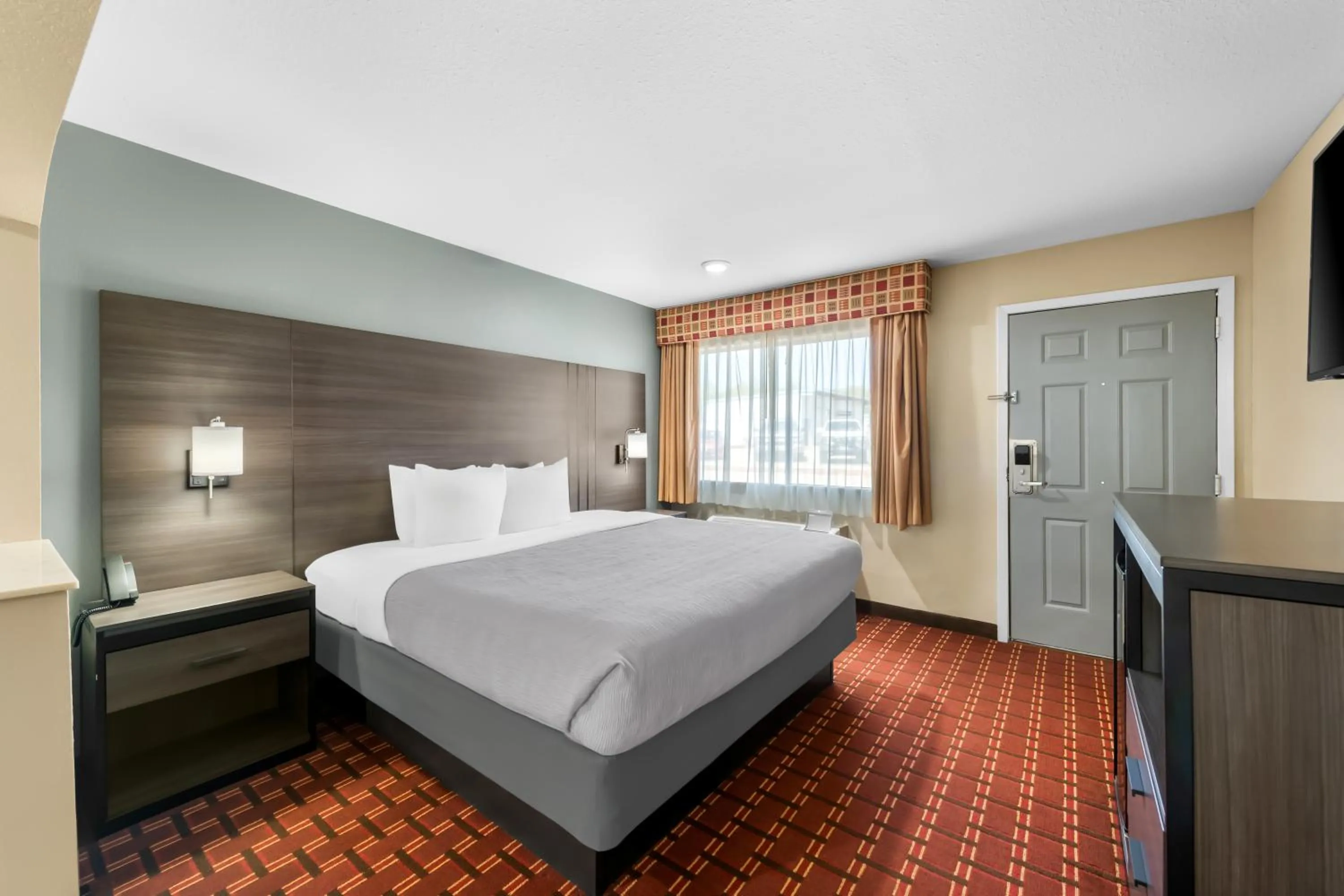 Bed in Quality Inn Marshall