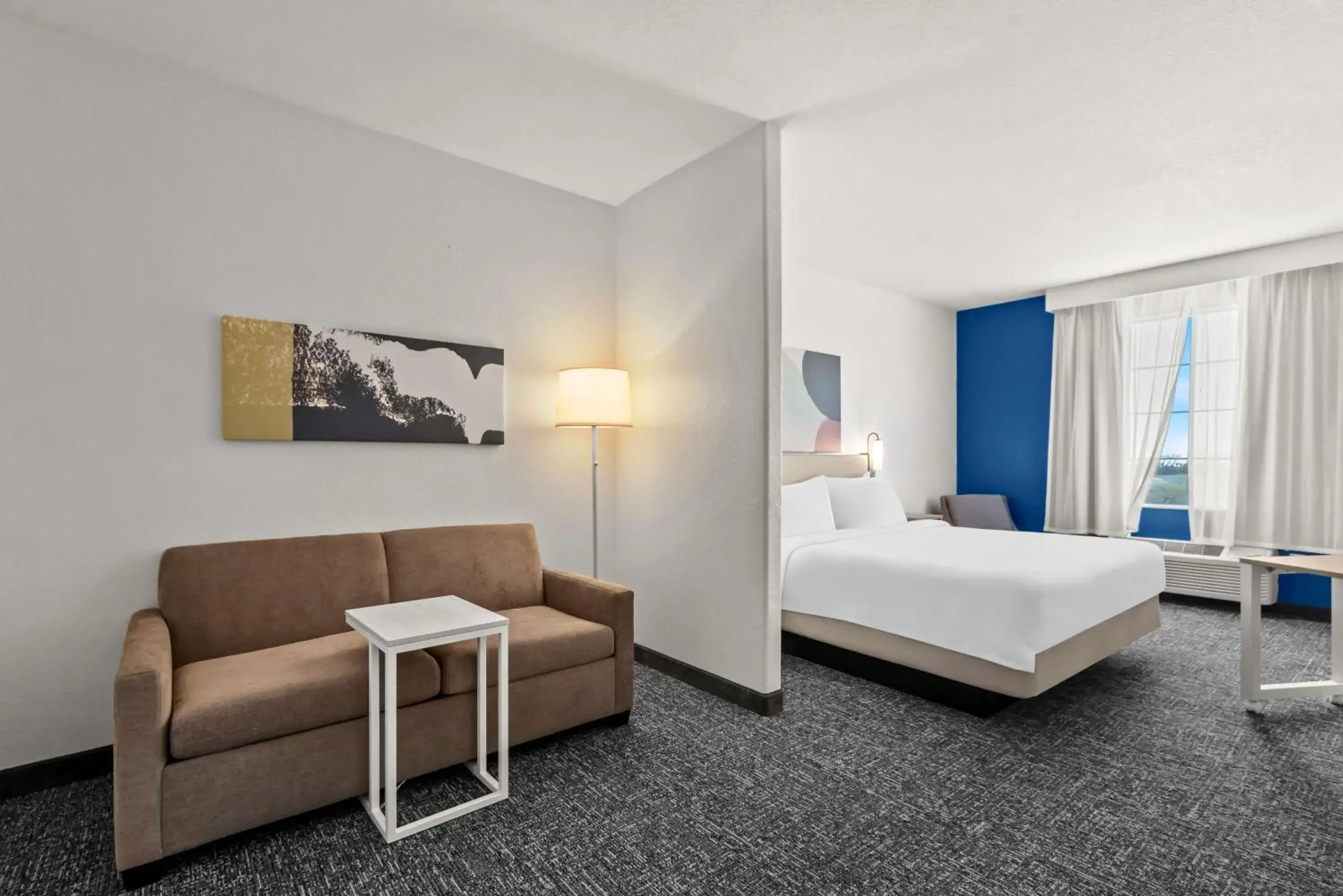 Living room, Bed in Spark by Hilton Selma Living room, Bed in Spark by Hilton Selma