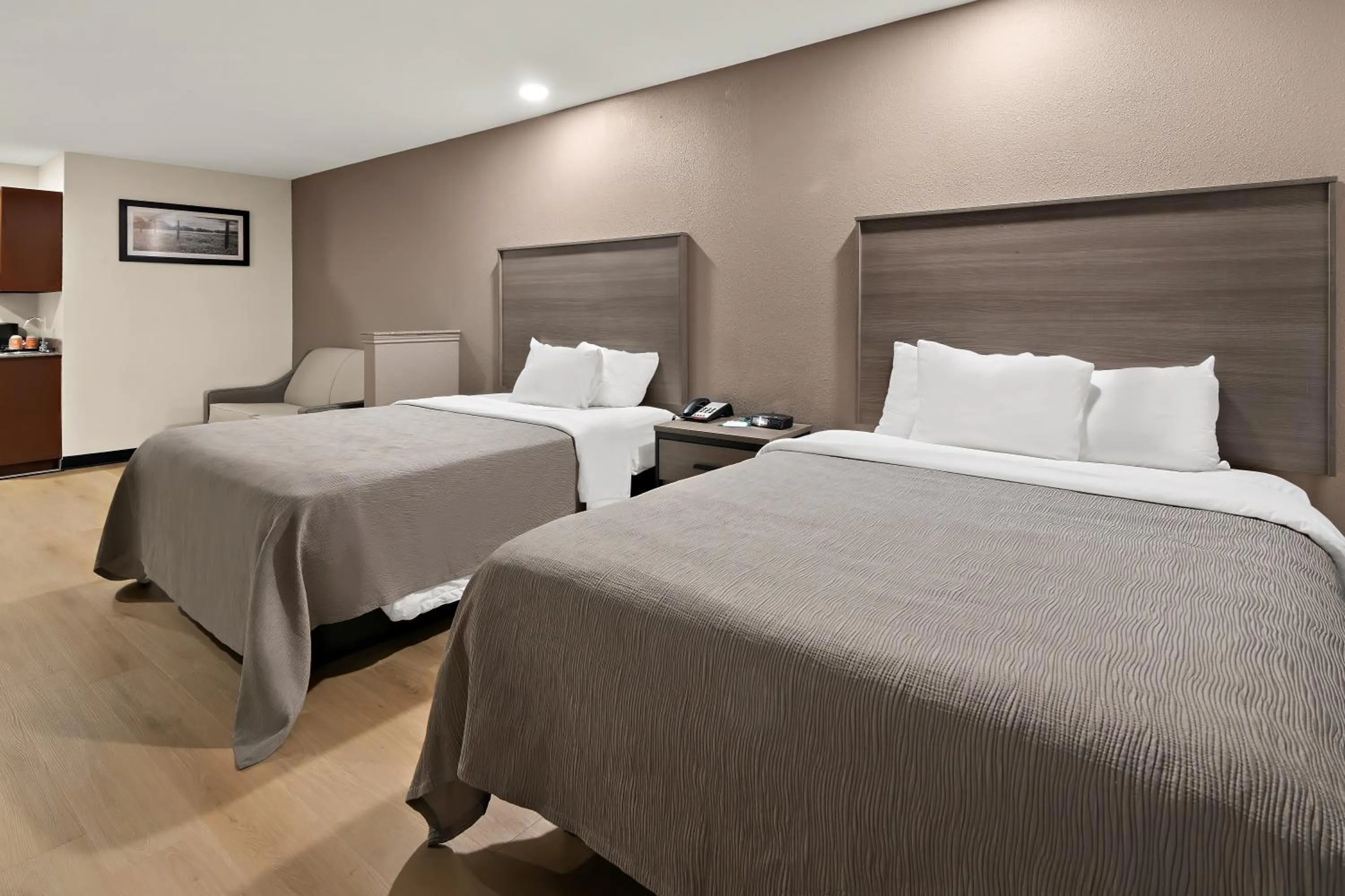 Bed in Quality Inn & Suites Weatherford