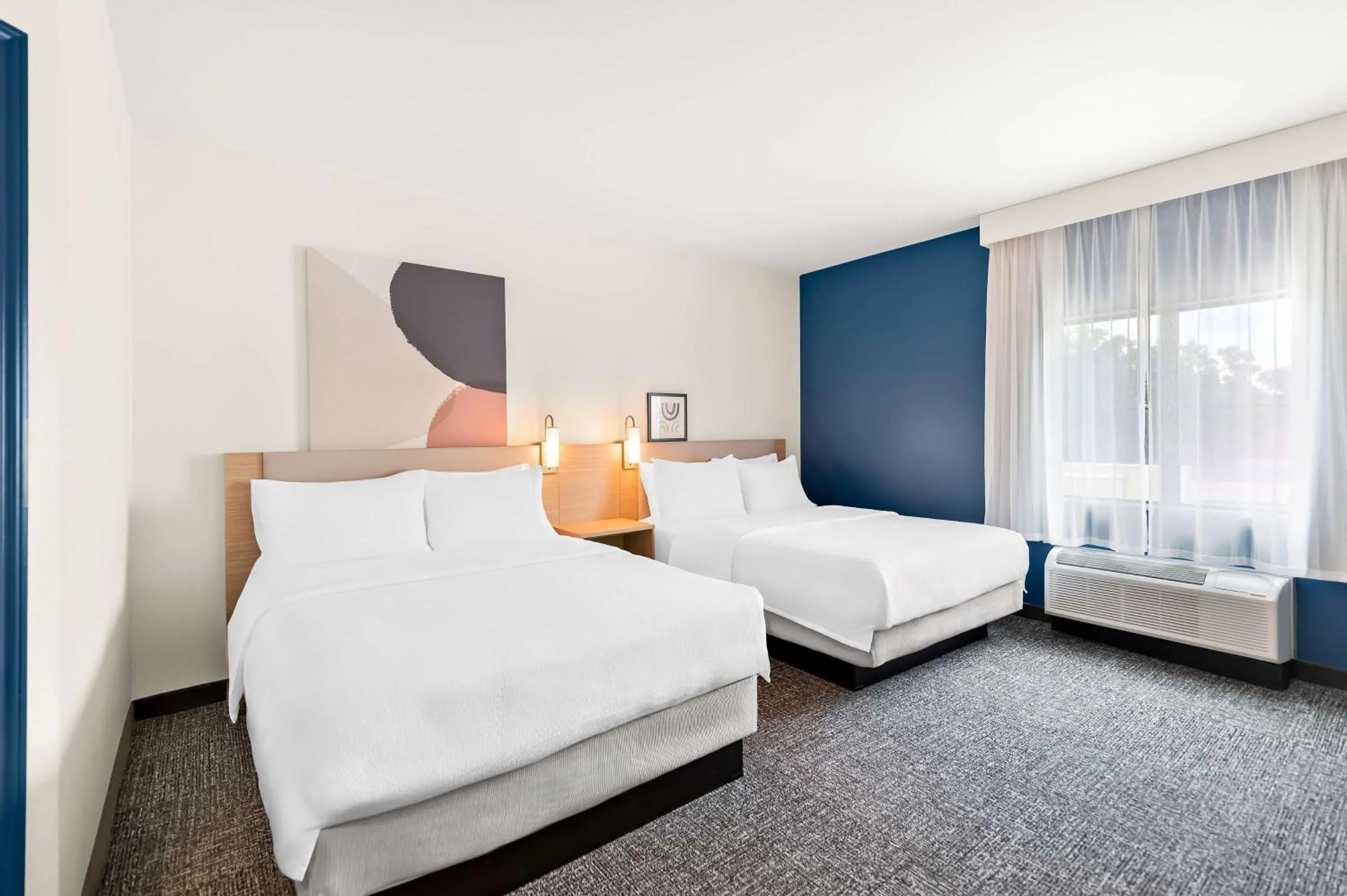 Bed in Hawthorn Suites by Wyndham Longview