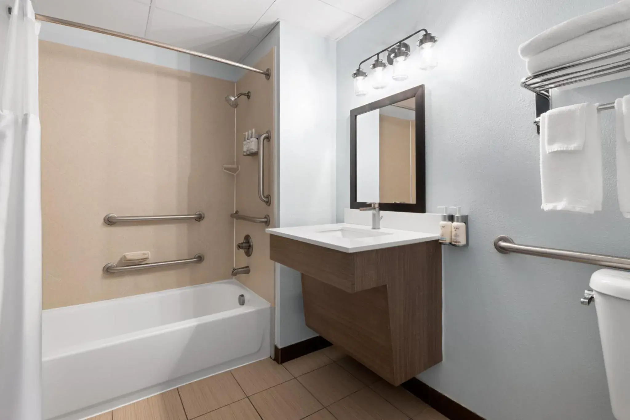 Bathroom in Garner Hotel Virginia Beach North by IHG Bathroom in Garner Hotel Virginia Beach North by IHG