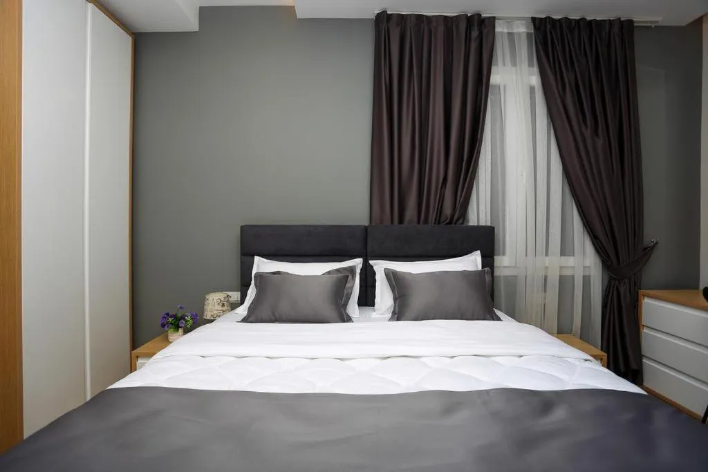 Bed in Emerald Boutique Hotel