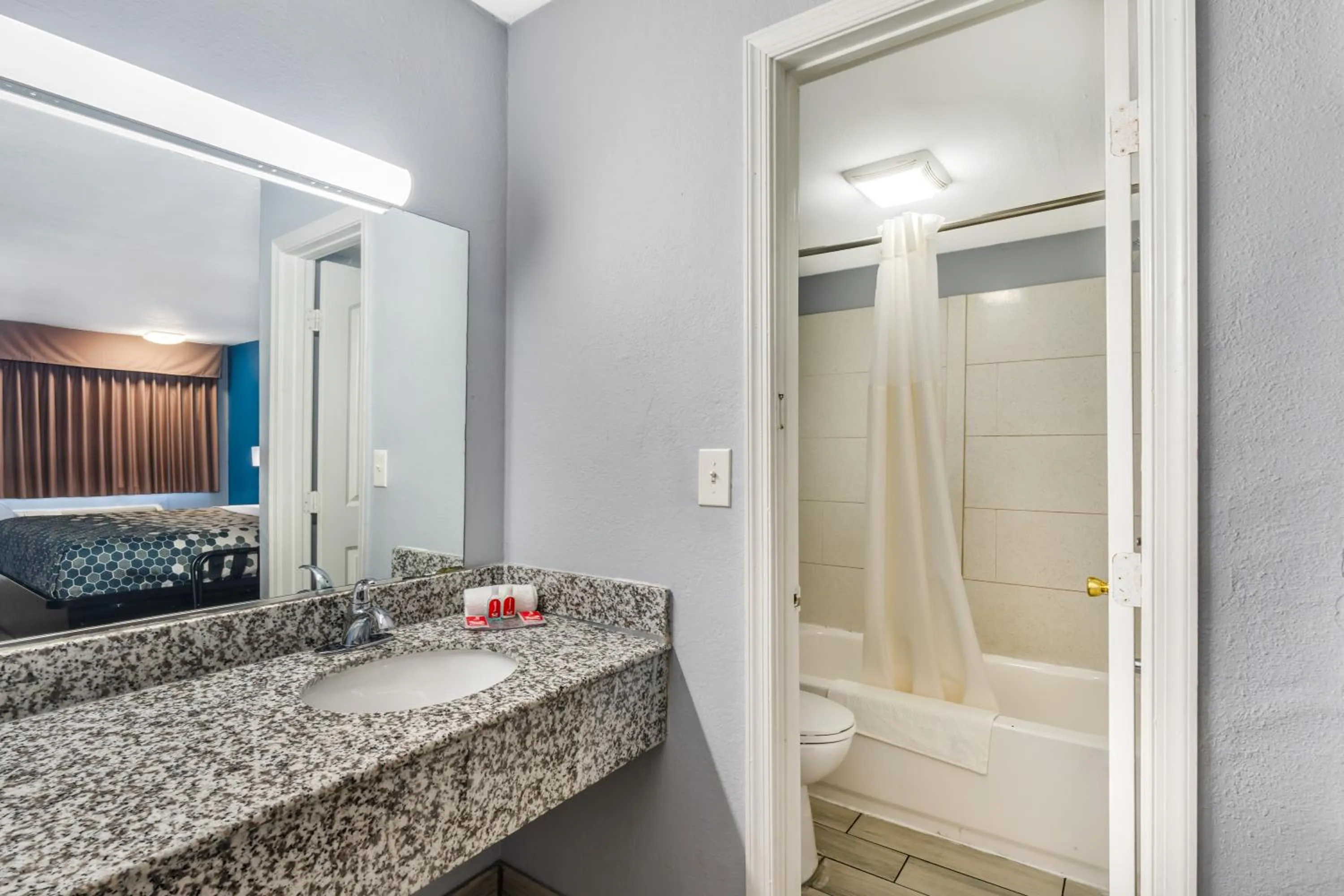 Bathroom in Econo Lodge Inn & Suites Virginia Beach - Norfolk