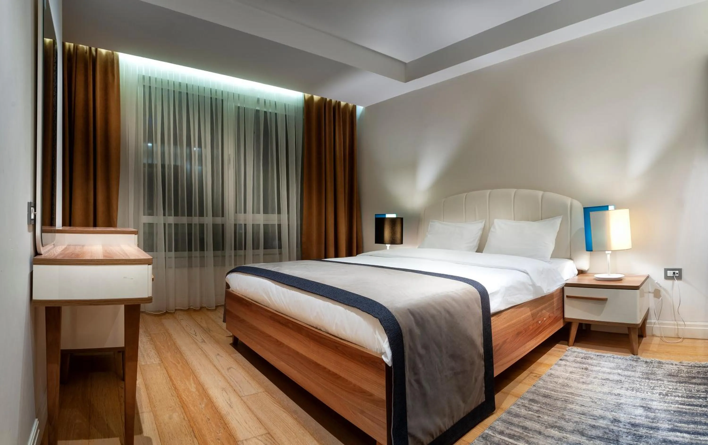 Bed in Armoni Residence & Hotel