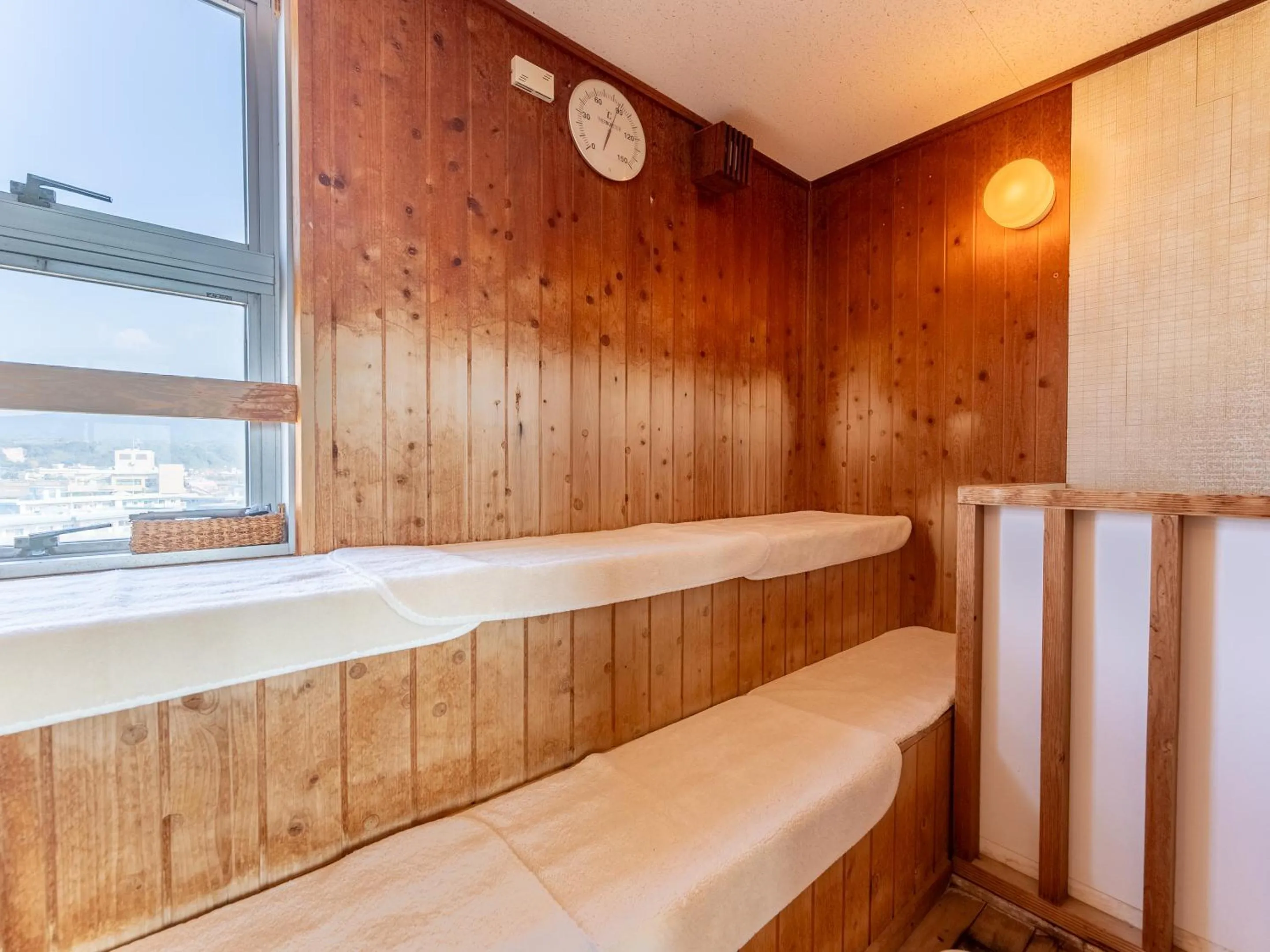 Bed in LiVEMAX RESORT Sakurajima Sea Front